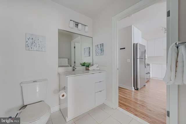a view of a hallway with washer and dryer