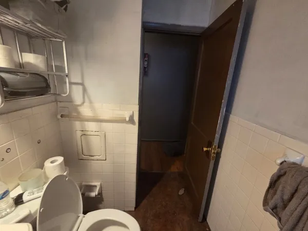 a bathroom with a sink and toilet