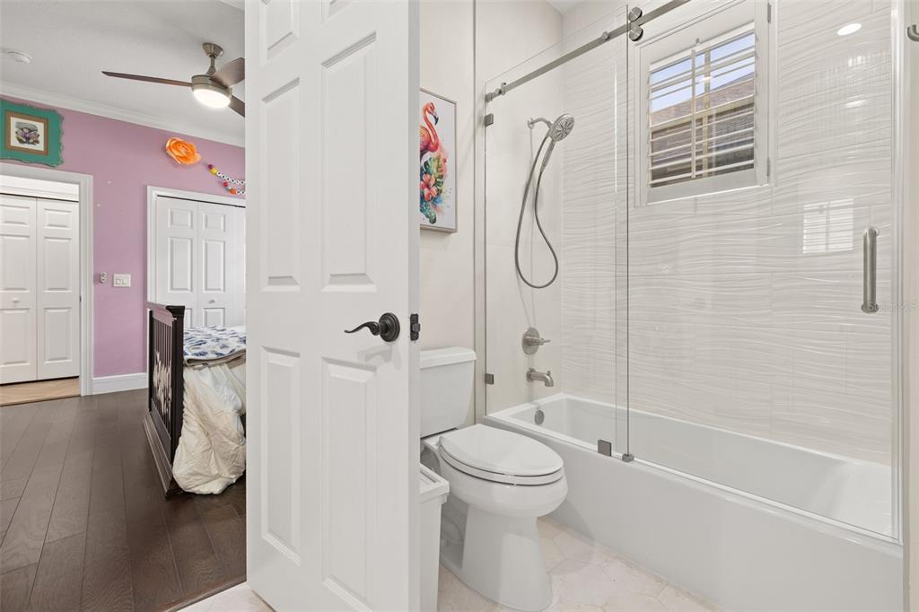 8351 Bowden Way Windermere, FL 34786 - Photo 35 of 71 a bathroom with a shower a toilet and a shower