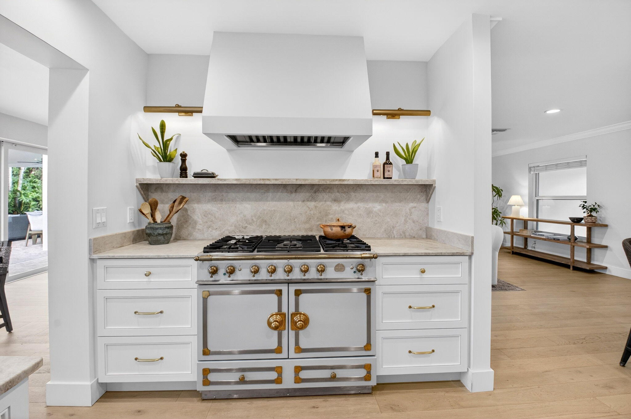 525 Sunset Road Boynton Beach, FL 33435 - Photo 14 of 62 a kitchen with a stove and cabinets