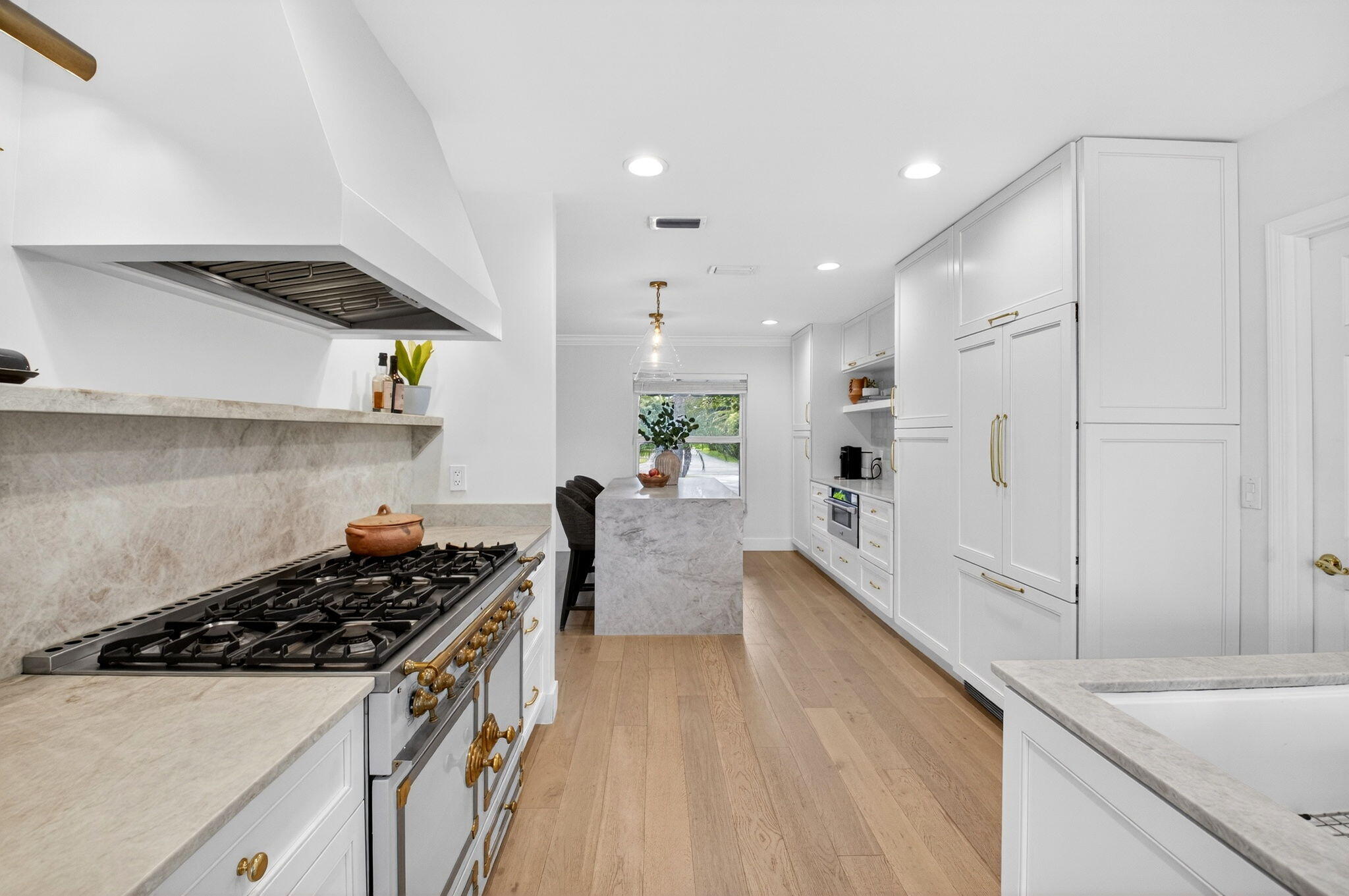 525 Sunset Road Boynton Beach, FL 33435 - Photo 18 of 62 a kitchen with stainless steel appliances granite countertop a sink stove and refrigerator