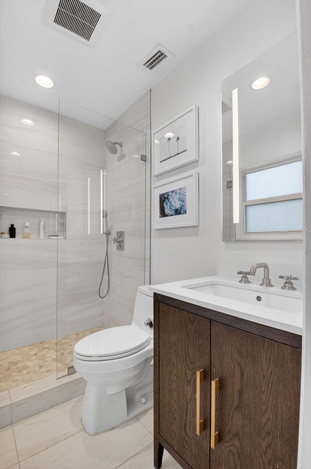 525 Sunset Road Boynton Beach, FL 33435 - Photo 36 of 62 a bathroom with a sink toilet and shower