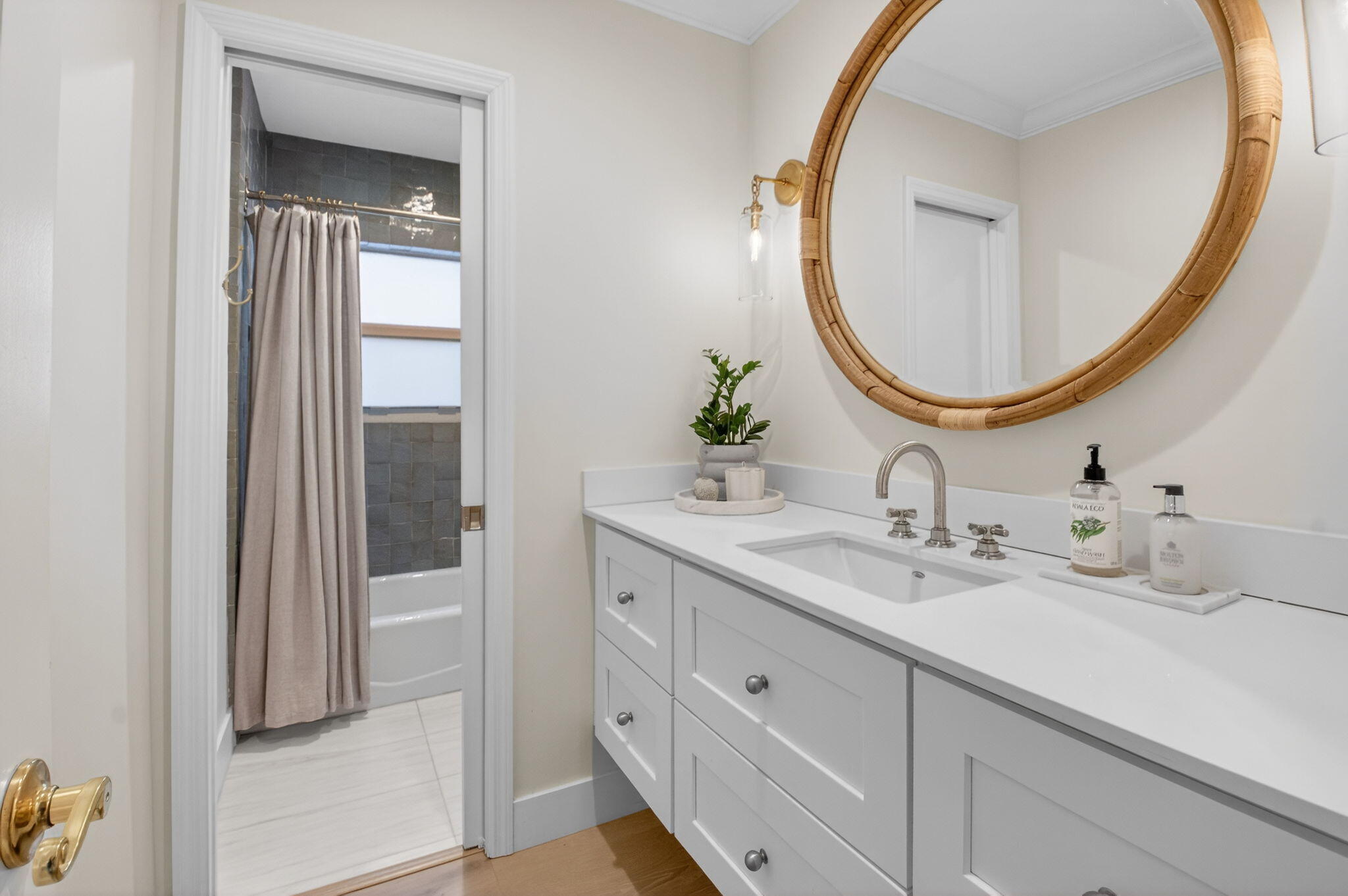 525 Sunset Road Boynton Beach, FL 33435 - Photo 39 of 62 a bathroom with a sink and a mirror