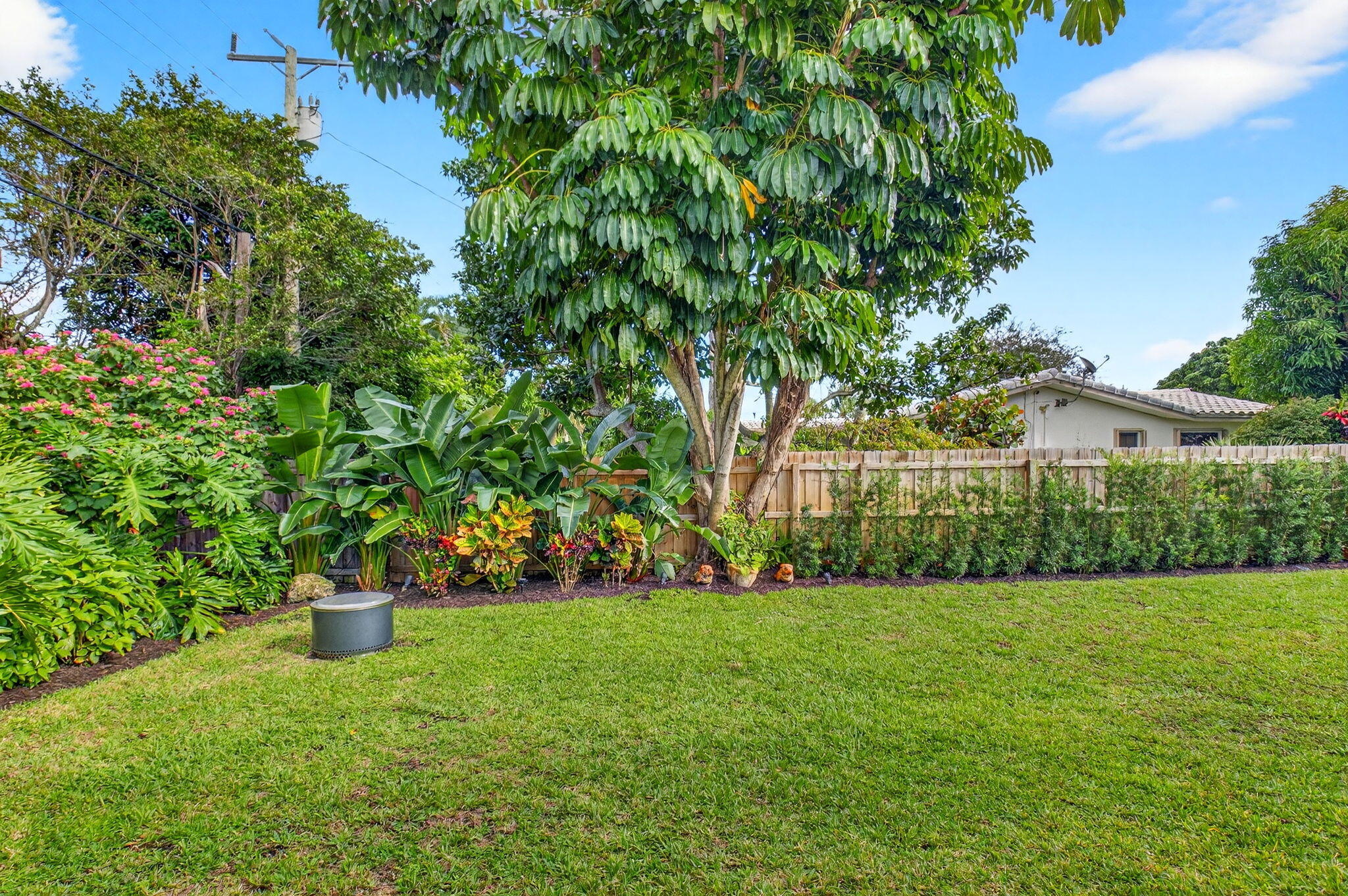 525 Sunset Road Boynton Beach, FL 33435 - Photo 50 of 62 a view of a garden with a house