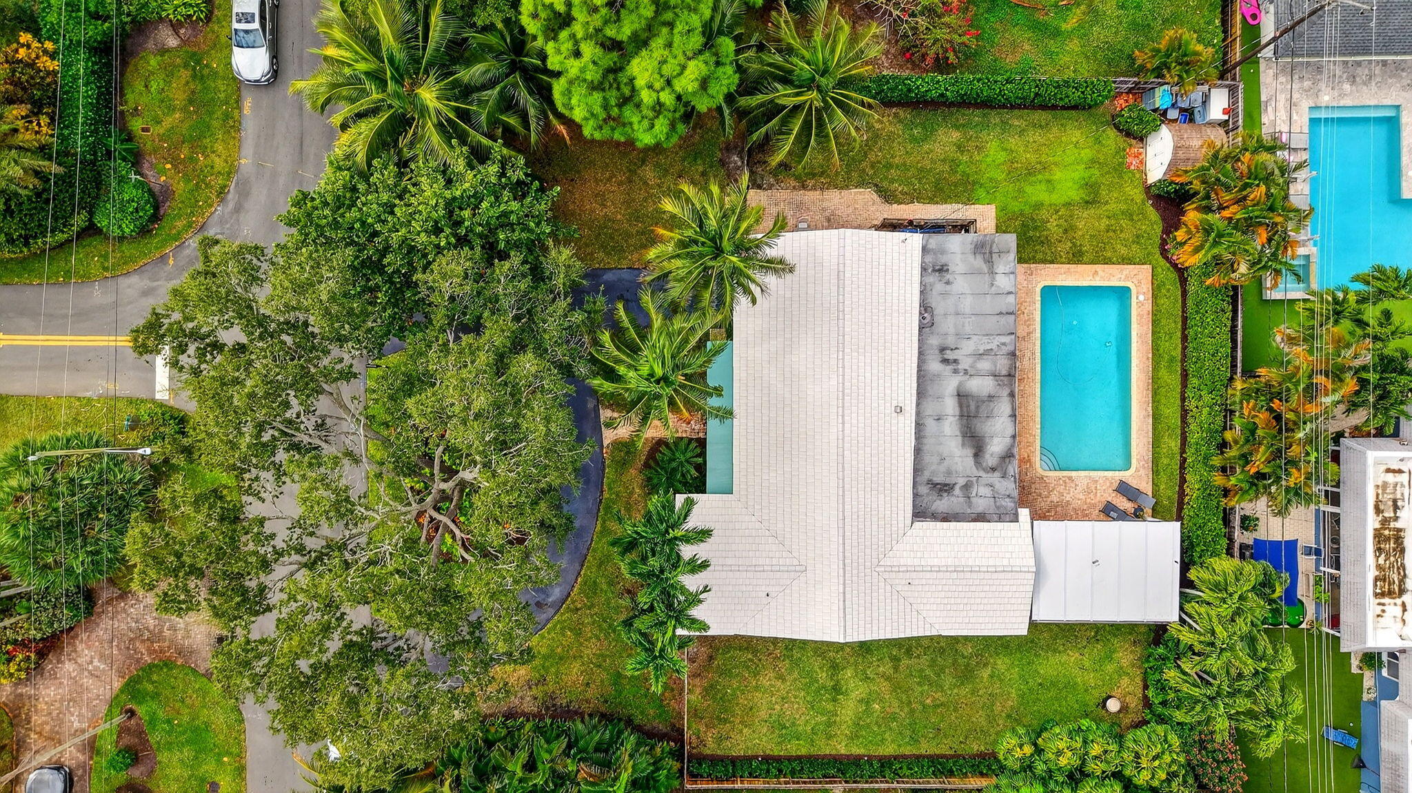525 Sunset Road Boynton Beach, FL 33435 - Photo 56 of 62 an aerial view of a house with a yard and garden