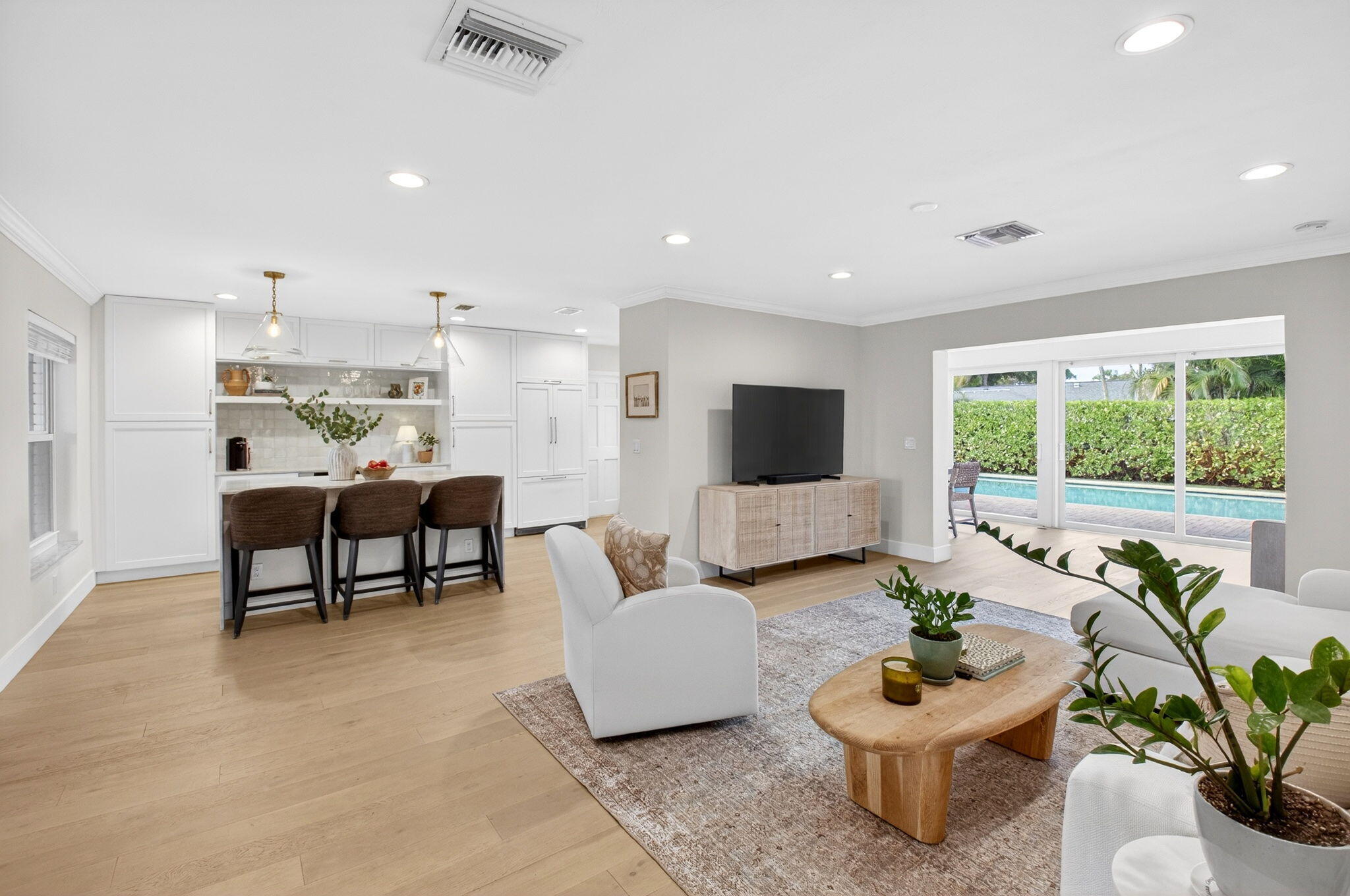 525 Sunset Road Boynton Beach, FL 33435 - Photo 8 of 62 a living room with furniture and a potted plant