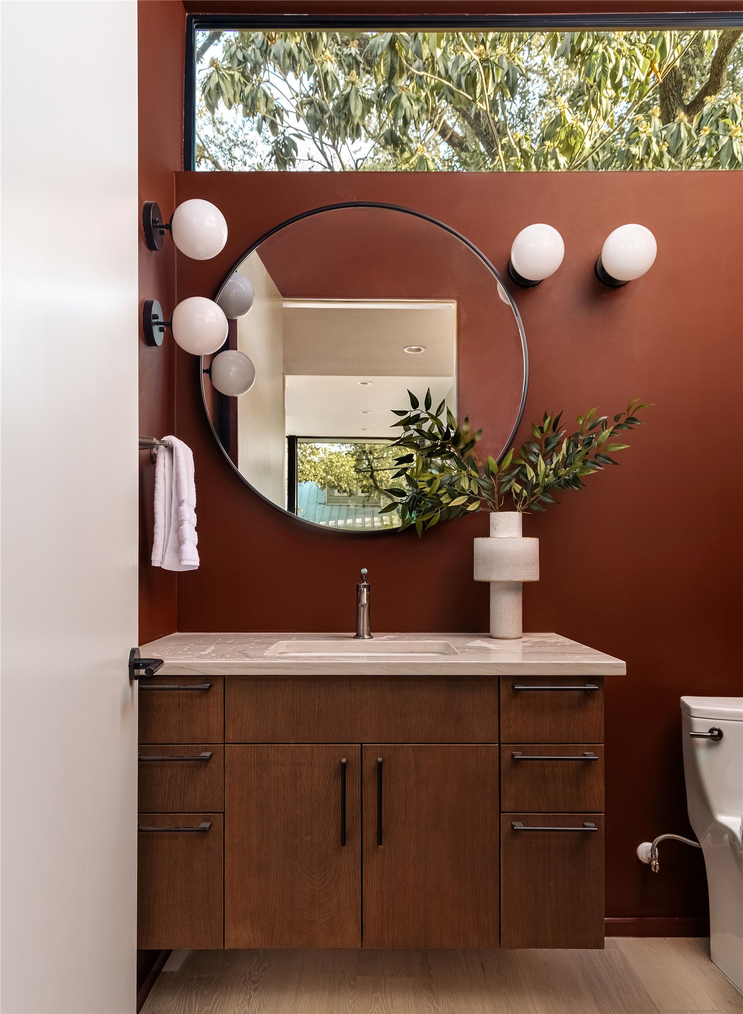915 Columbus Street Austin, TX 78704 - Photo 16 of 34 Bathroom featuring vanity and light wood-style flooring