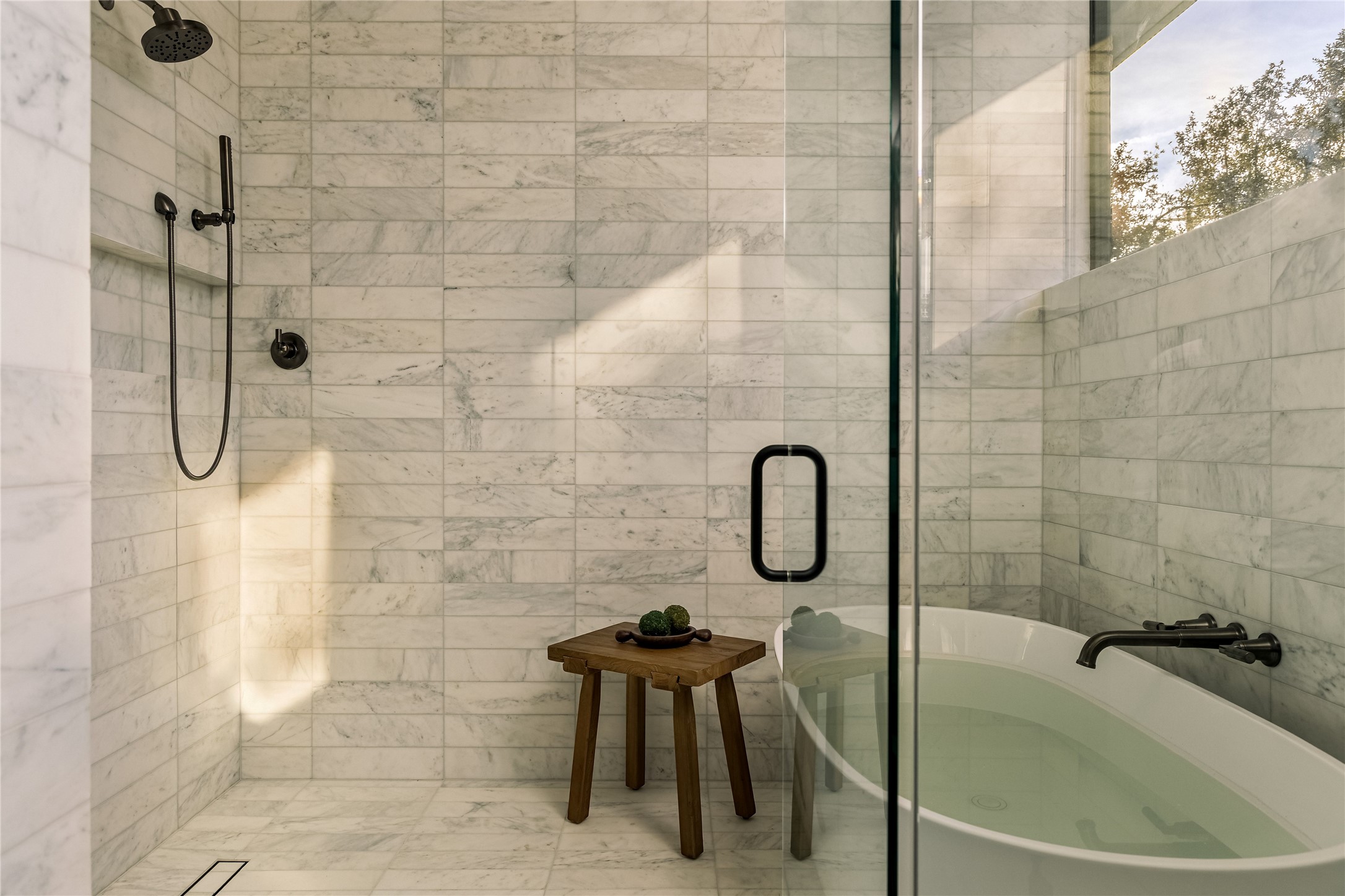 915 Columbus Street Austin, TX 78704 - Photo 22 of 34 Bathroom with a freestanding tub and a tile shower