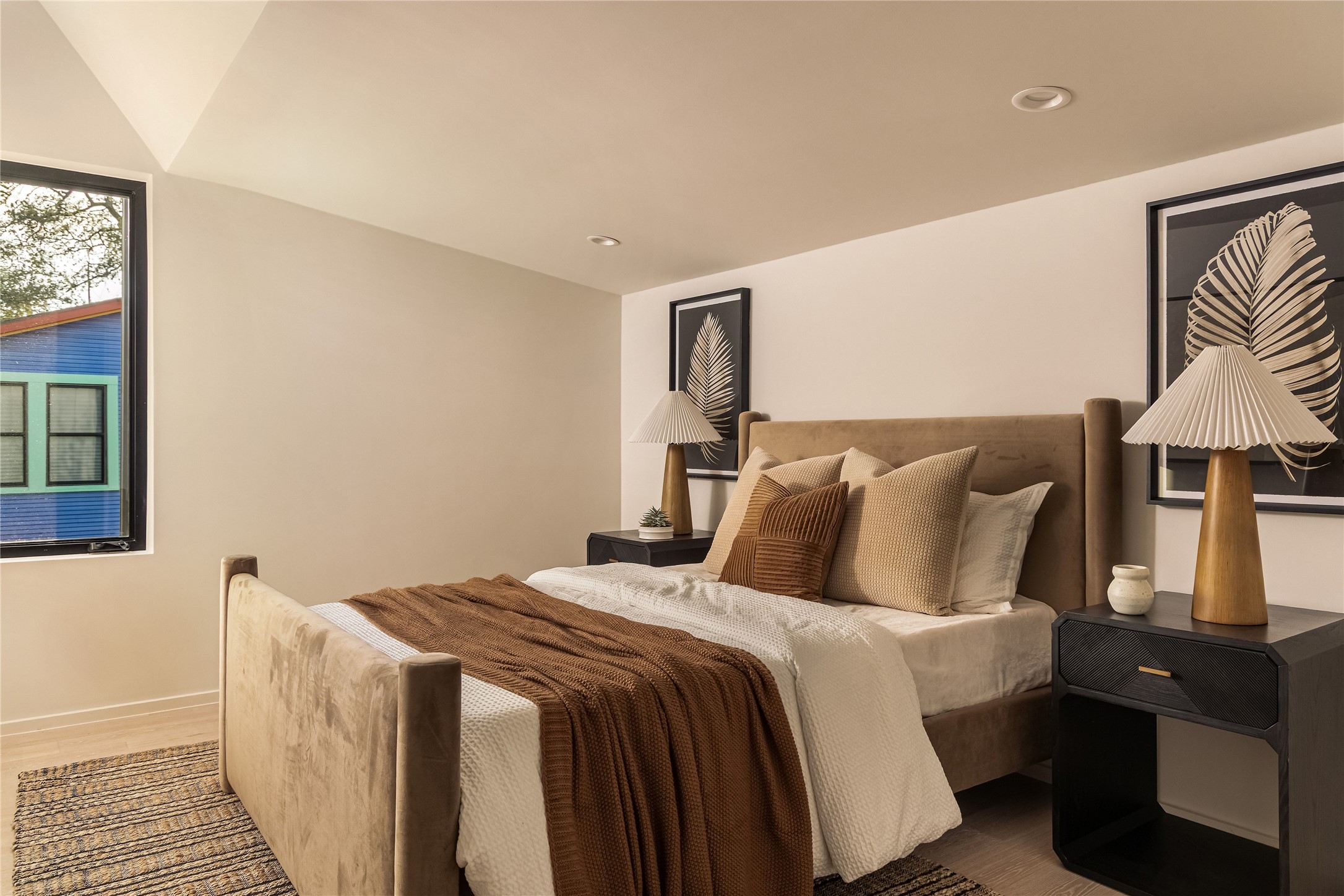 915 Columbus Street Austin, TX 78704 - Photo 26 of 34 Bedroom with recessed lighting and wood finished floors