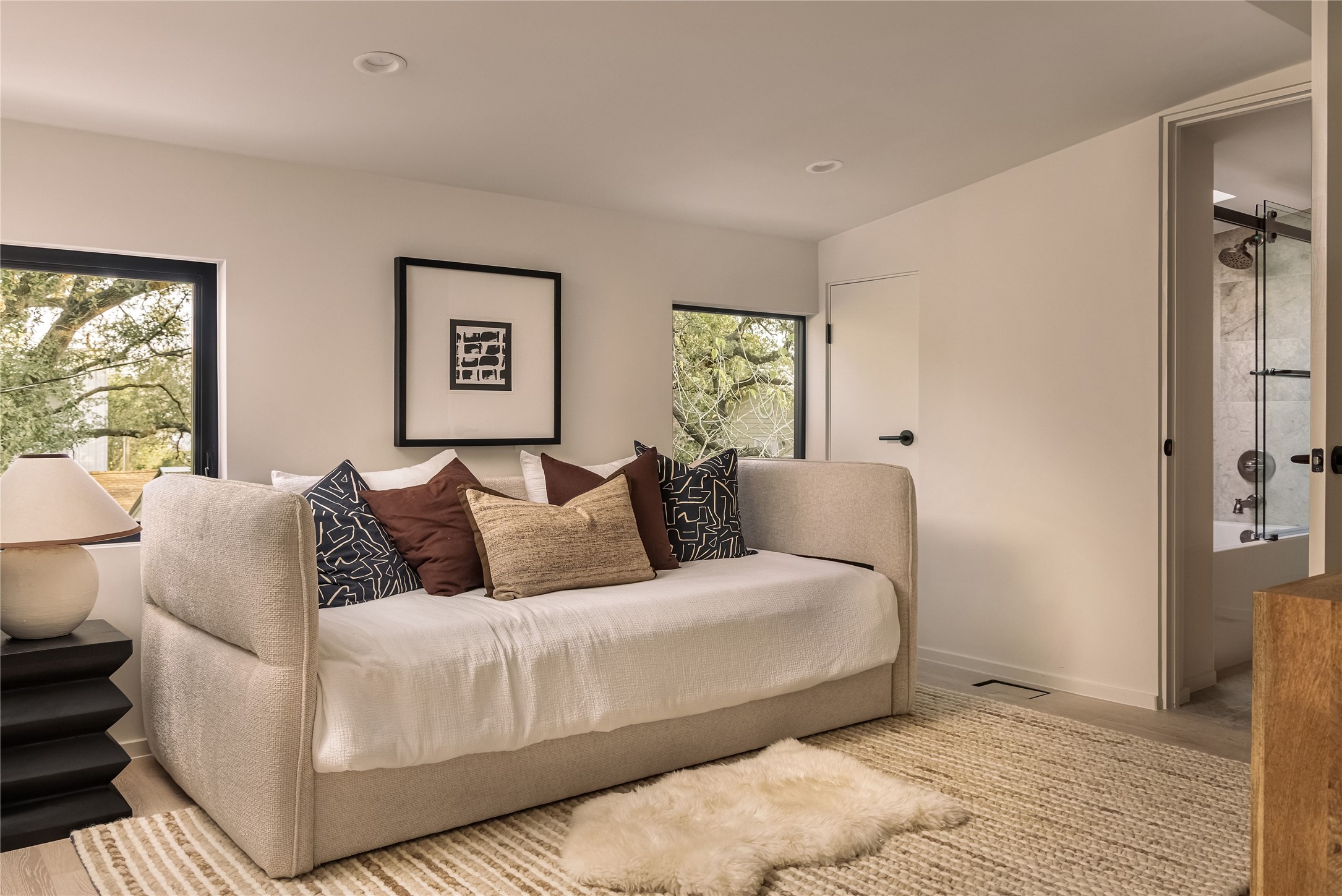 915 Columbus Street Austin, TX 78704 - Photo 28 of 34 Living area featuring wood finished floors and recessed lighting
