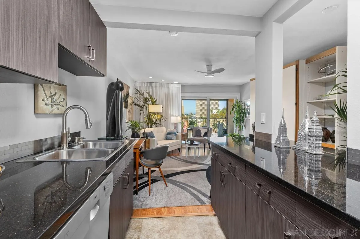 3980 8th Avenue, Unit 308 San Diego, CA 92103 - Photo 18 of 33 a kitchen with sink stove and cabinets