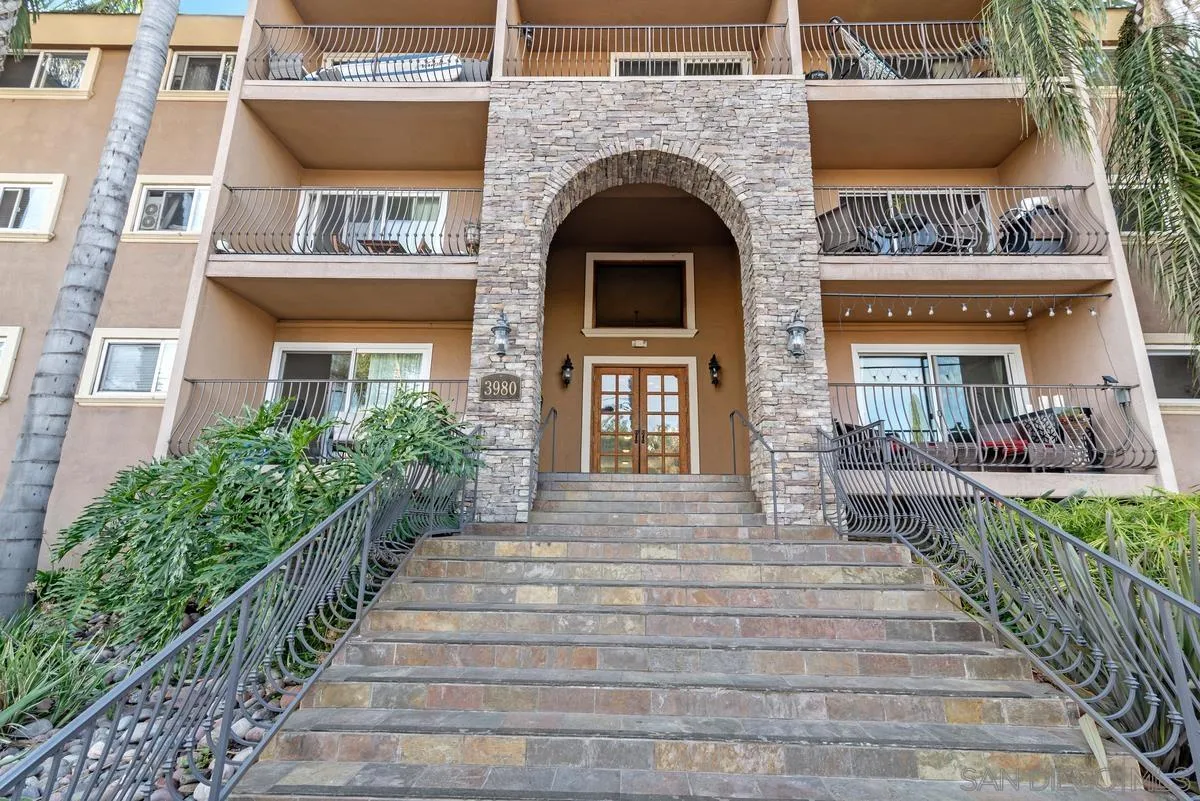 3980 8th Avenue, Unit 308 San Diego, CA 92103 - Photo 29 of 33 a front view of a house with outdoor seating