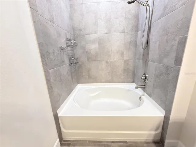 a bathroom with a bathtub