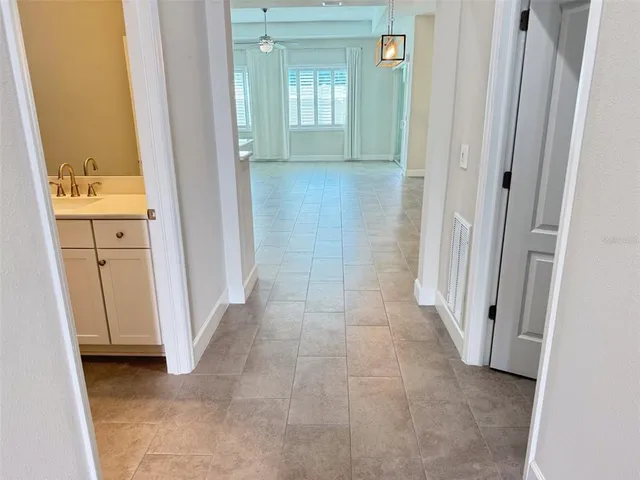 view of a bathroom with a sink and mirror