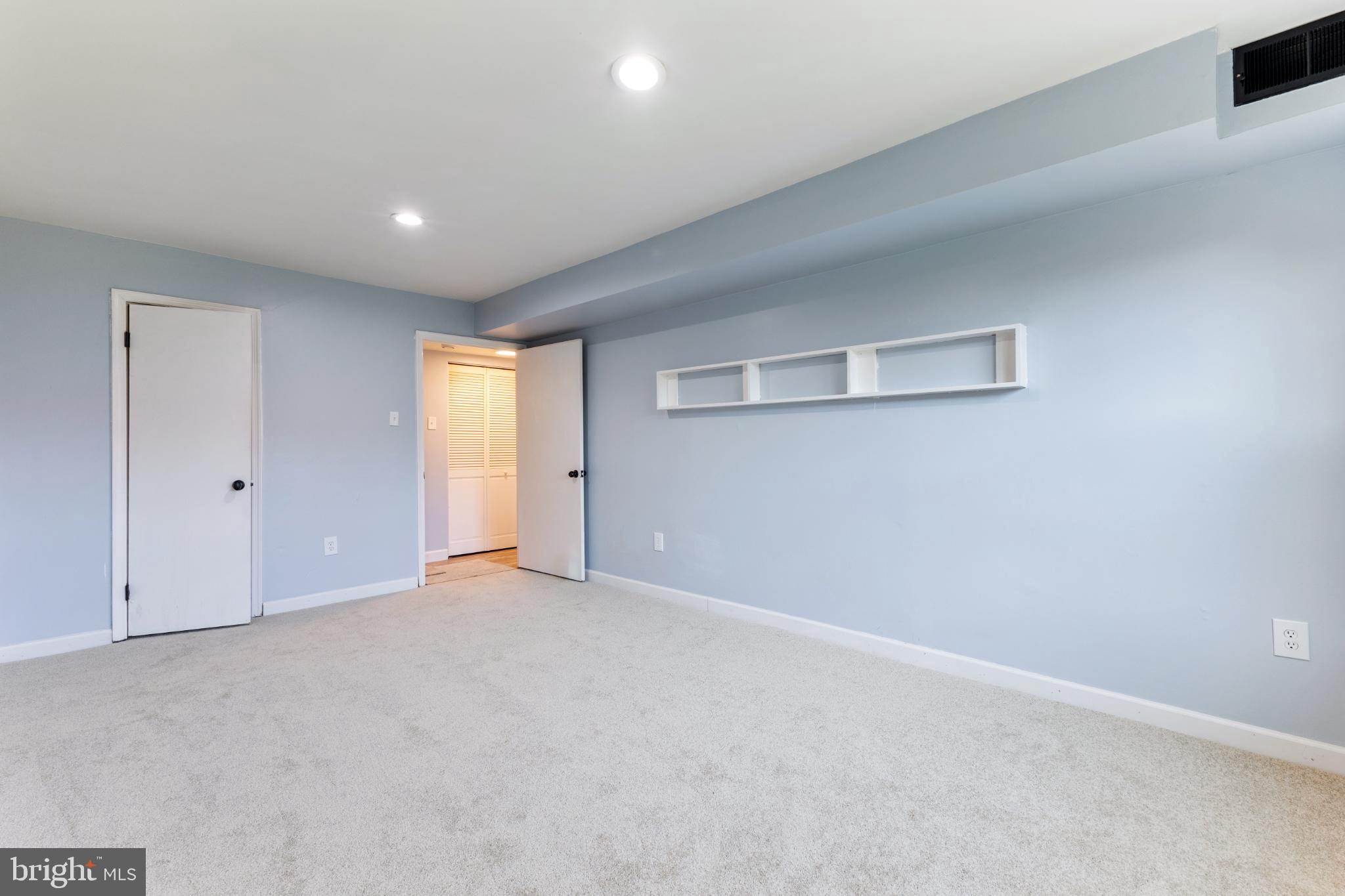 776 Quince Orchard Boulevard, Unit 102 Gaithersburg, MD 20878 - Photo 11 of 14 a view of an empty room with a window