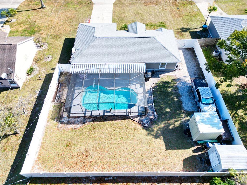 698 Colchester Avenue Deltona, FL 32738 - Photo 27 of 30 an aerial view of a house with a yard