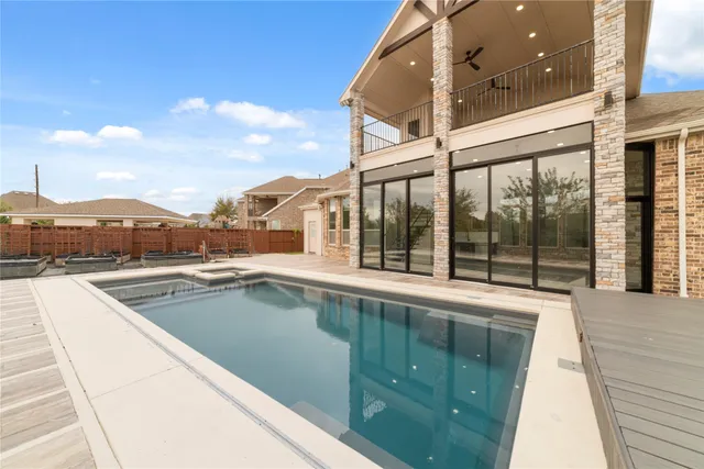 a view of a house with a swimming pool