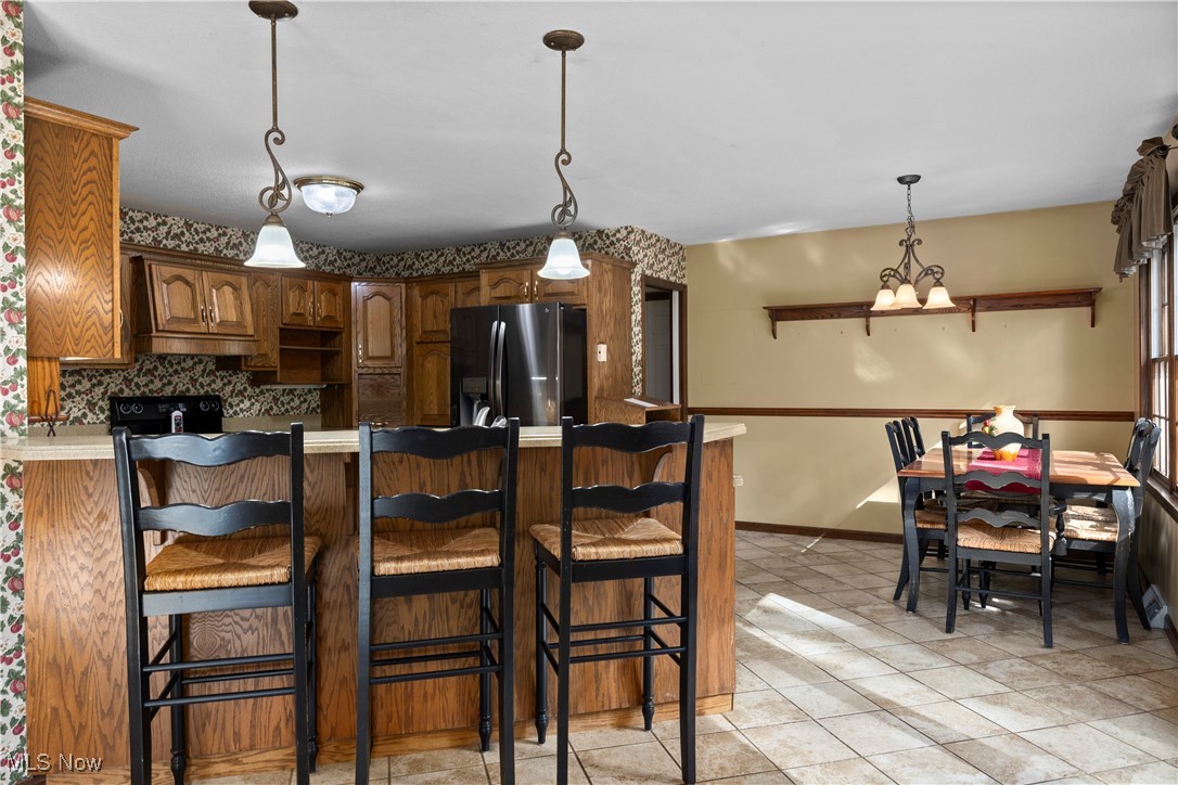 48221 Rice Road Amherst, OH 44001 - Photo 11 of 45 Barstools and dining table stay