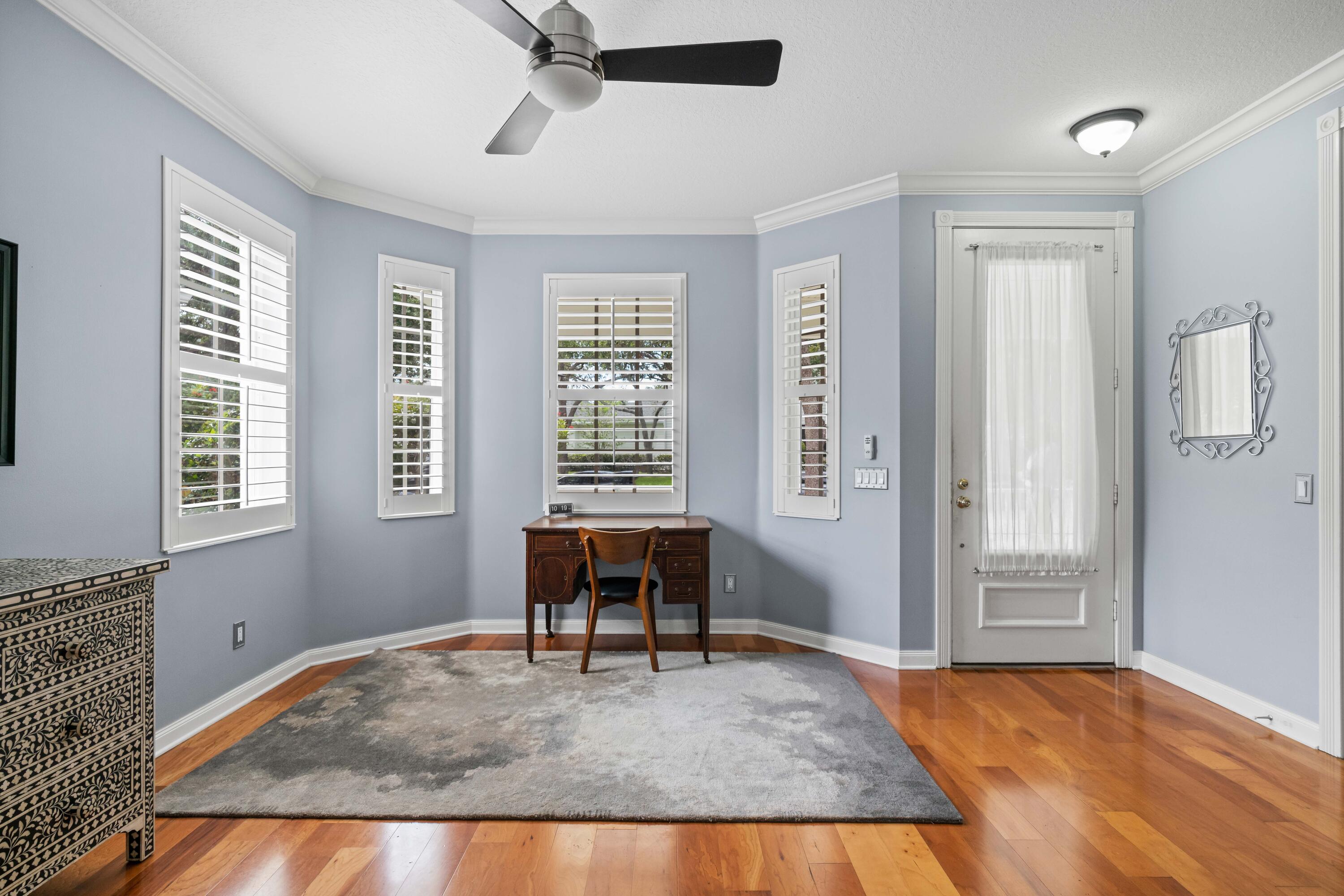 144 Sweet Bay Circle Jupiter, FL 33458 - Photo 19 of 46 a view of a livingroom with furniture and windows