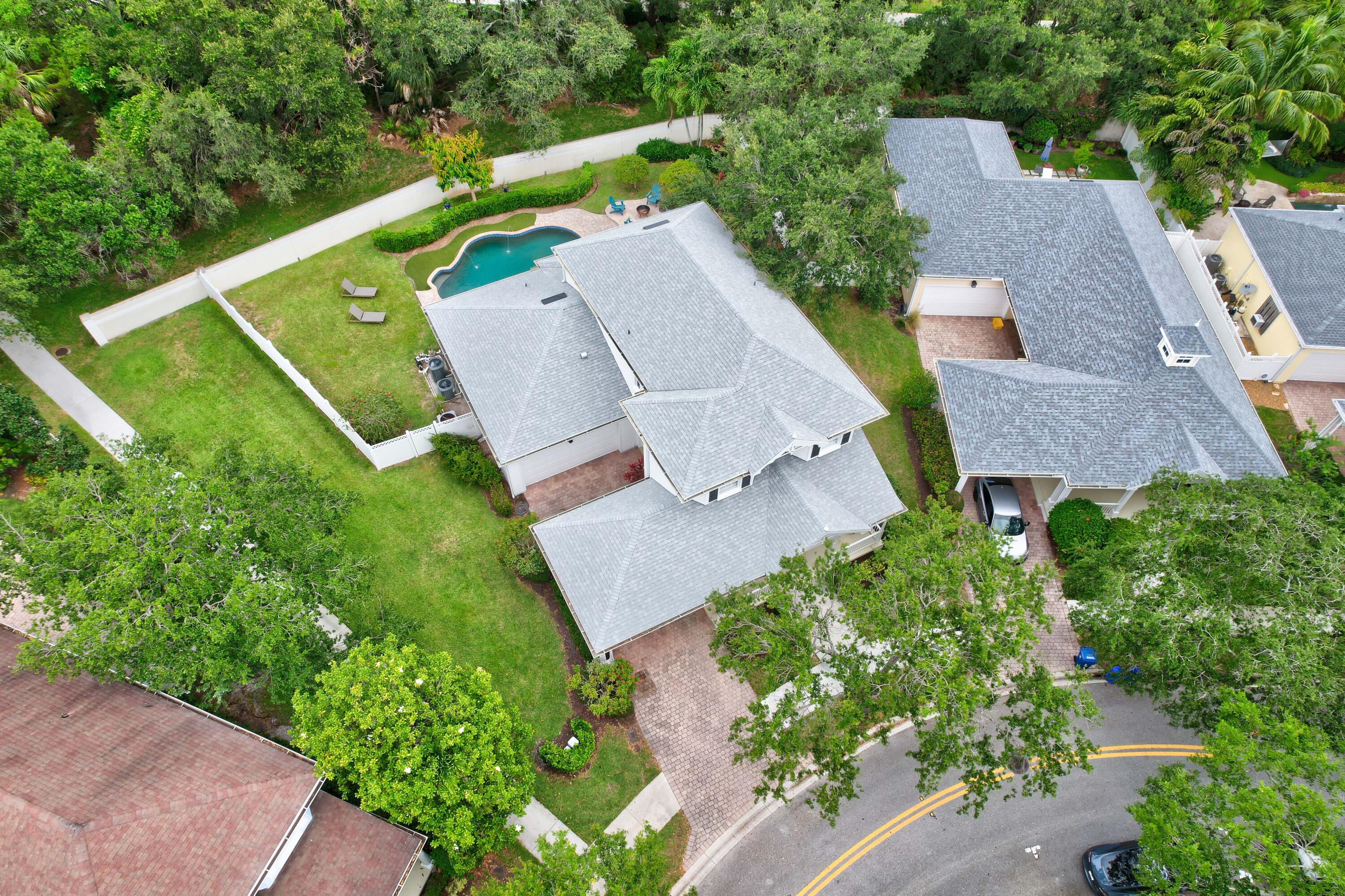 144 Sweet Bay Circle Jupiter, FL 33458 - Photo 2 of 46 an aerial view of a house