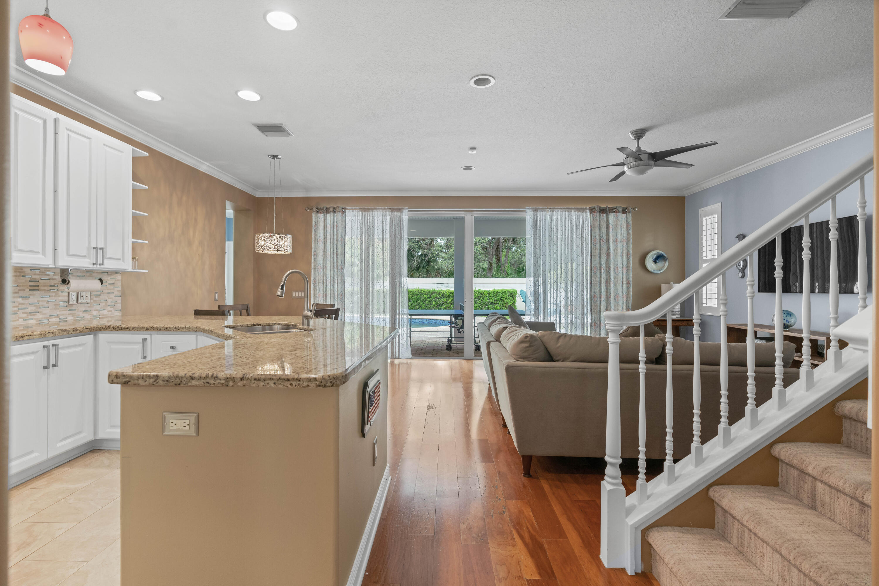 144 Sweet Bay Circle Jupiter, FL 33458 - Photo 21 of 46 a living room with furniture and a large window