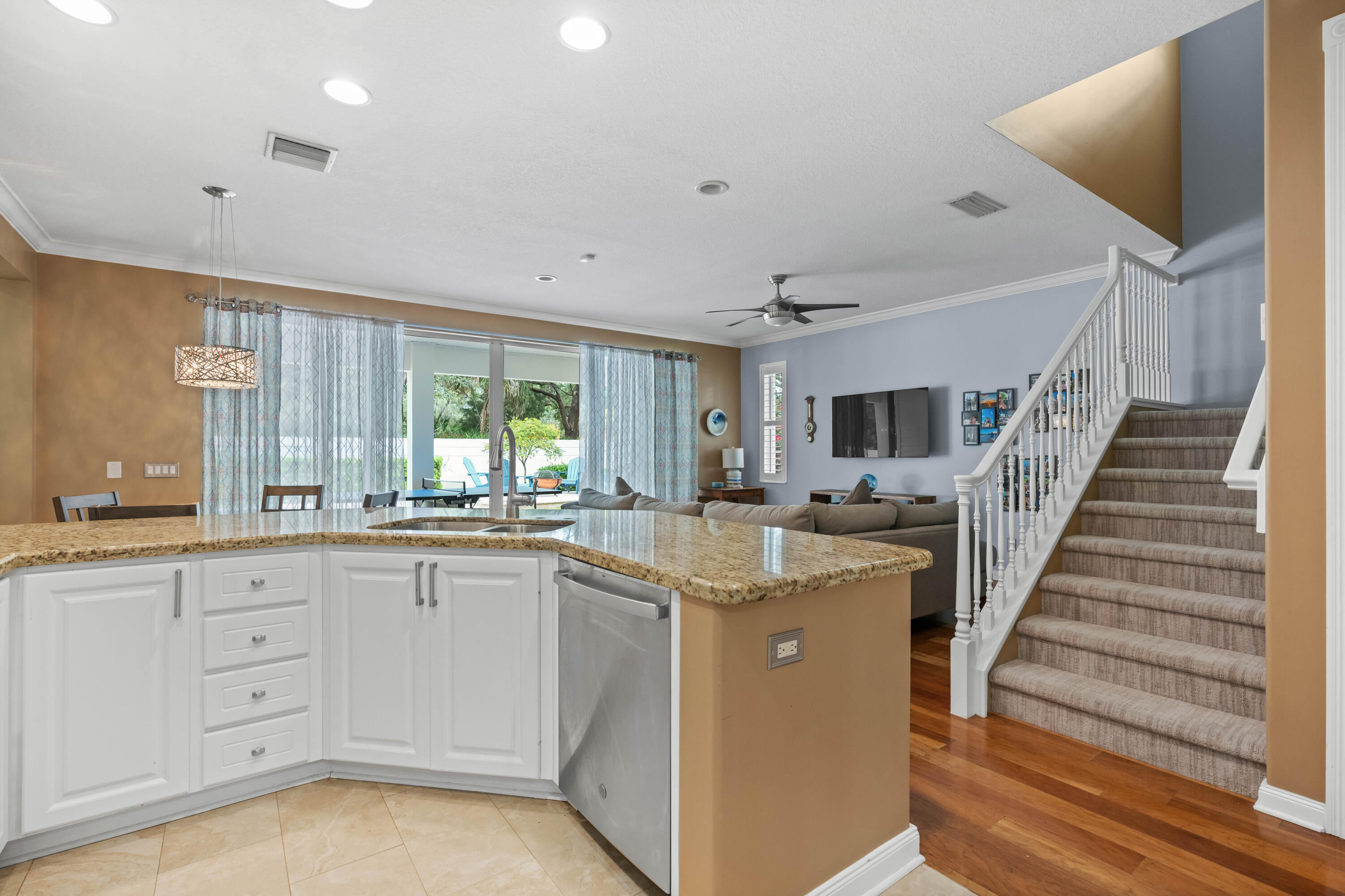 144 Sweet Bay Circle Jupiter, FL 33458 - Photo 23 of 46 a kitchen with sink cabinets and window