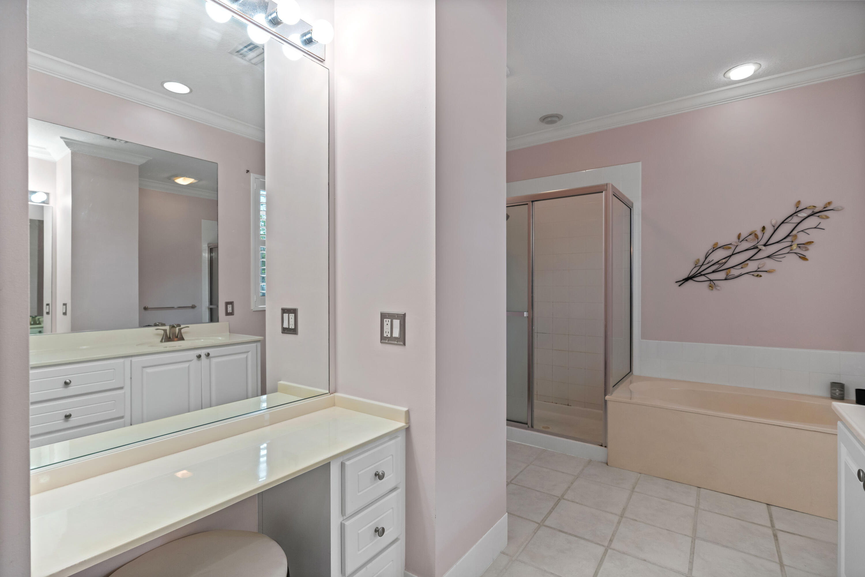 144 Sweet Bay Circle Jupiter, FL 33458 - Photo 32 of 46 a bathroom with a tub sink toilet and mirror