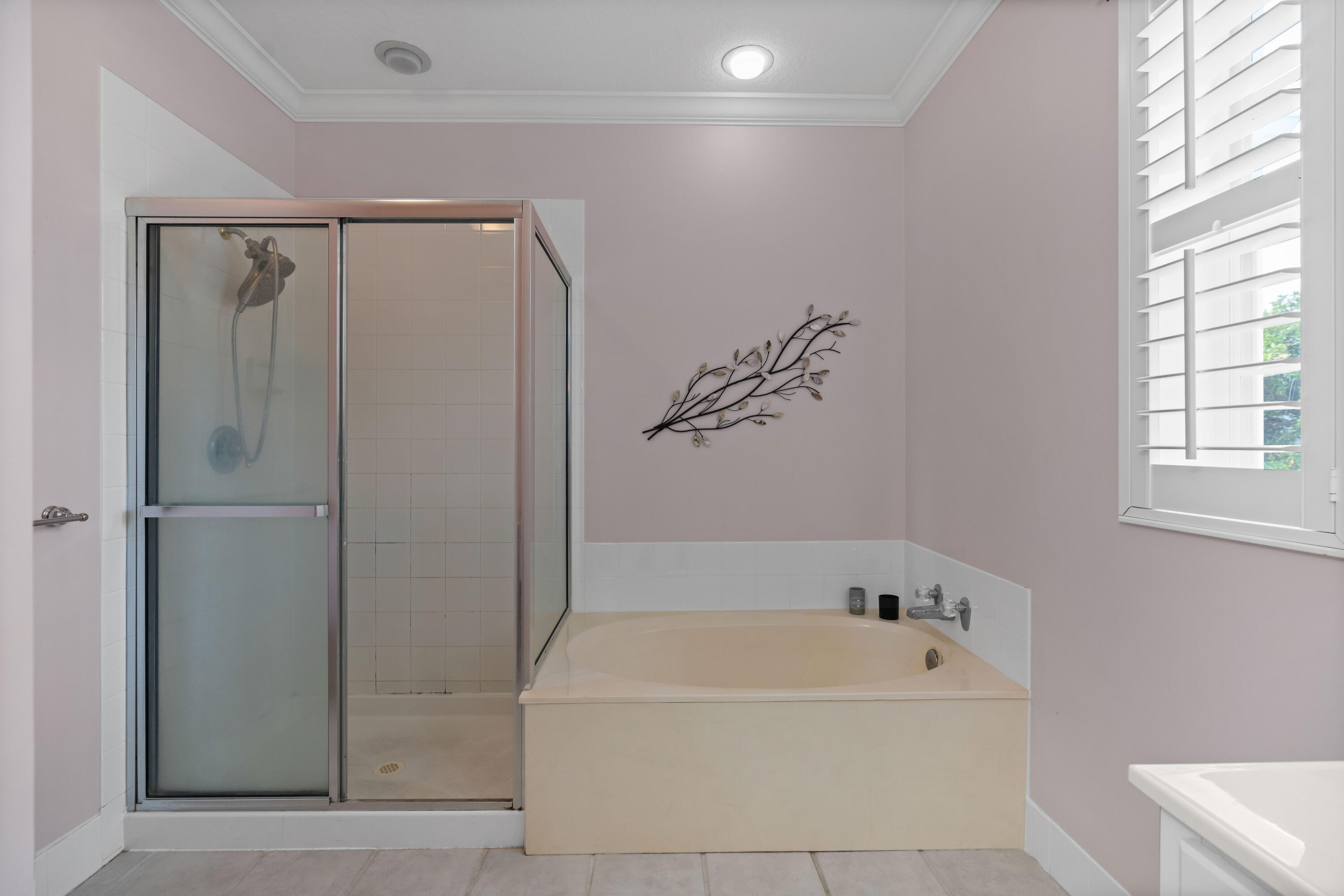 144 Sweet Bay Circle Jupiter, FL 33458 - Photo 33 of 46 a white bath tub sitting next to a shower