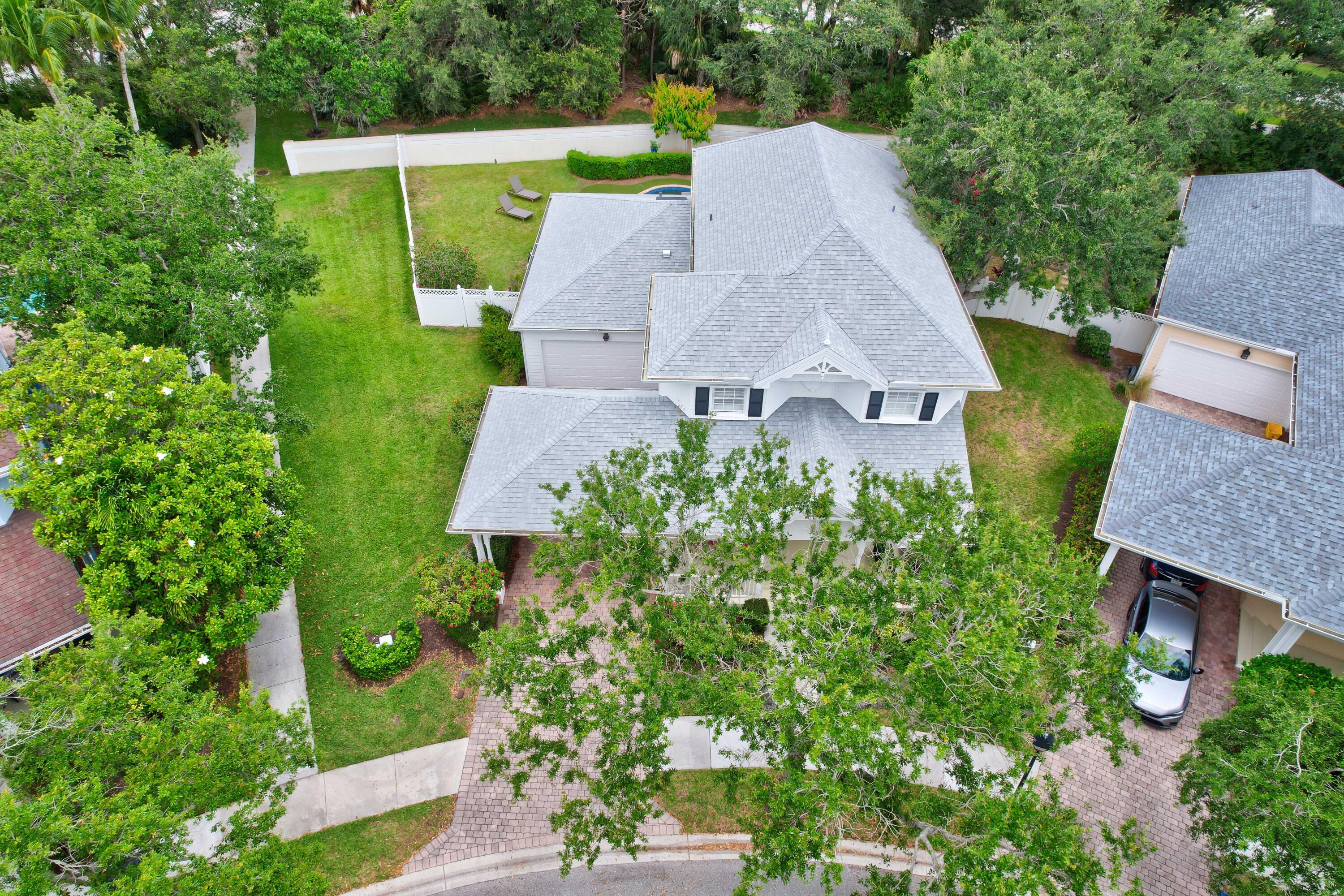 144 Sweet Bay Circle Jupiter, FL 33458 - Photo 36 of 46 an aerial view of a house