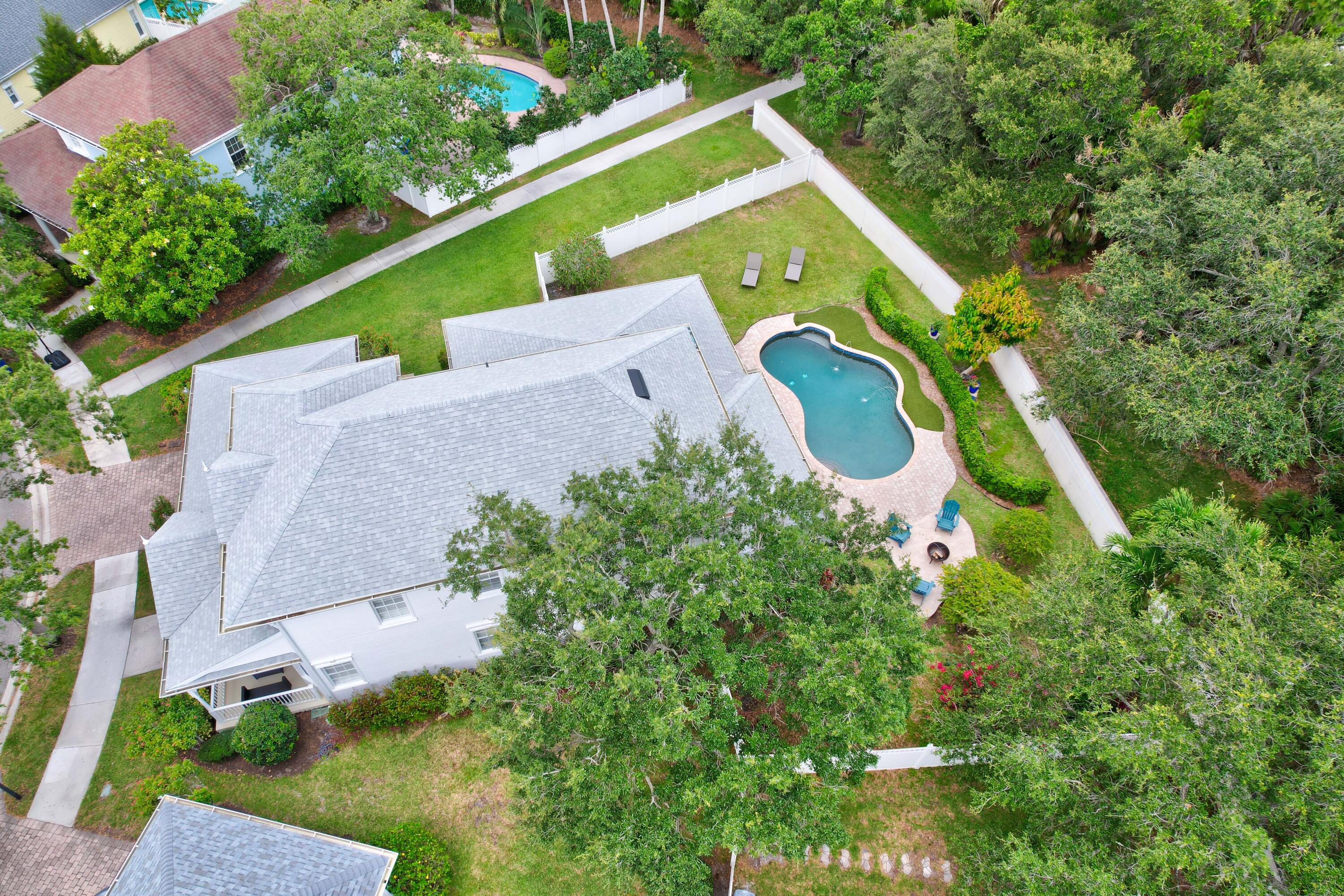 144 Sweet Bay Circle Jupiter, FL 33458 - Photo 37 of 46 an aerial view of a house