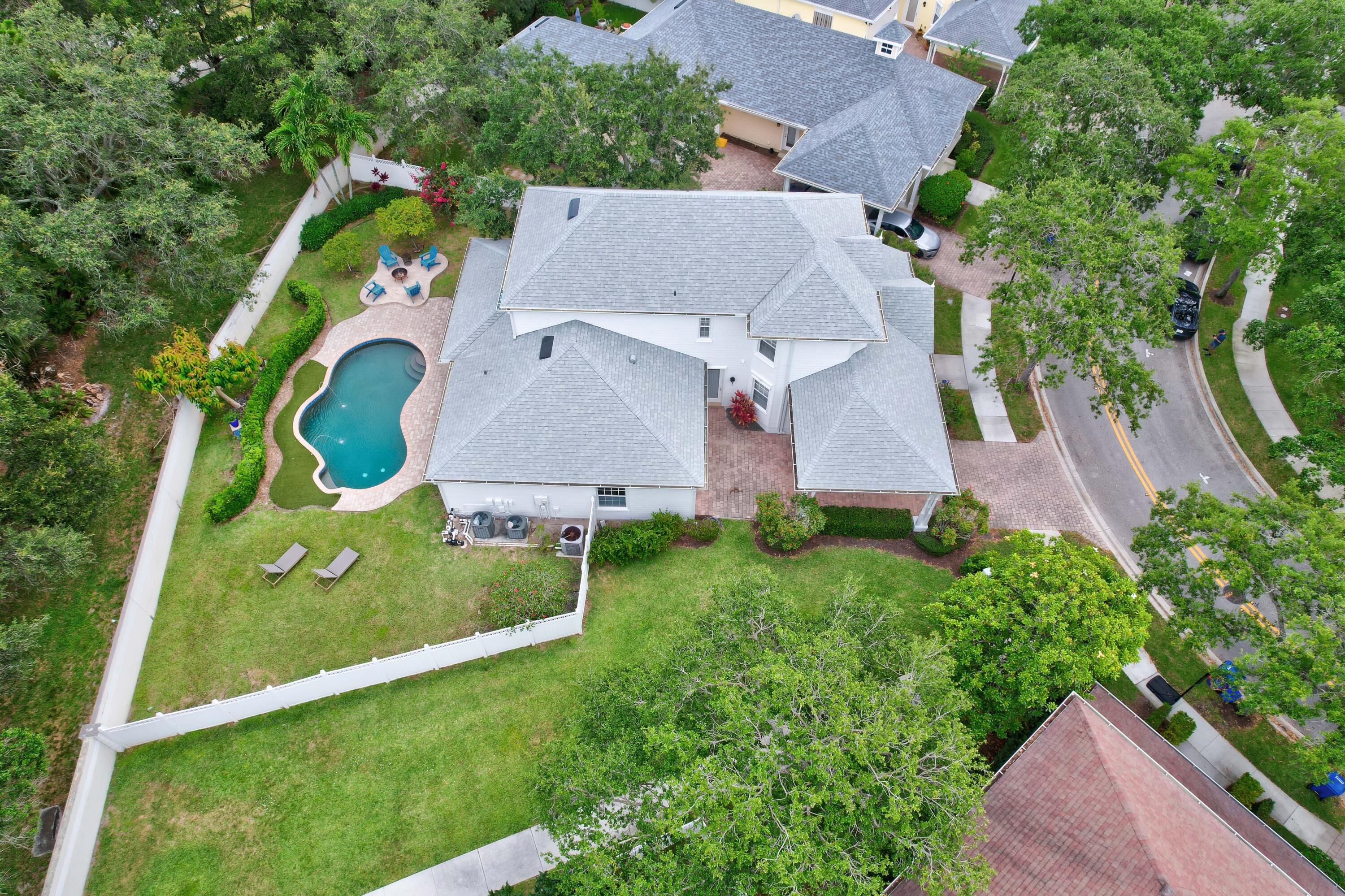 144 Sweet Bay Circle Jupiter, FL 33458 - Photo 40 of 46 an aerial view of house with yard swimming pool and outdoor seating