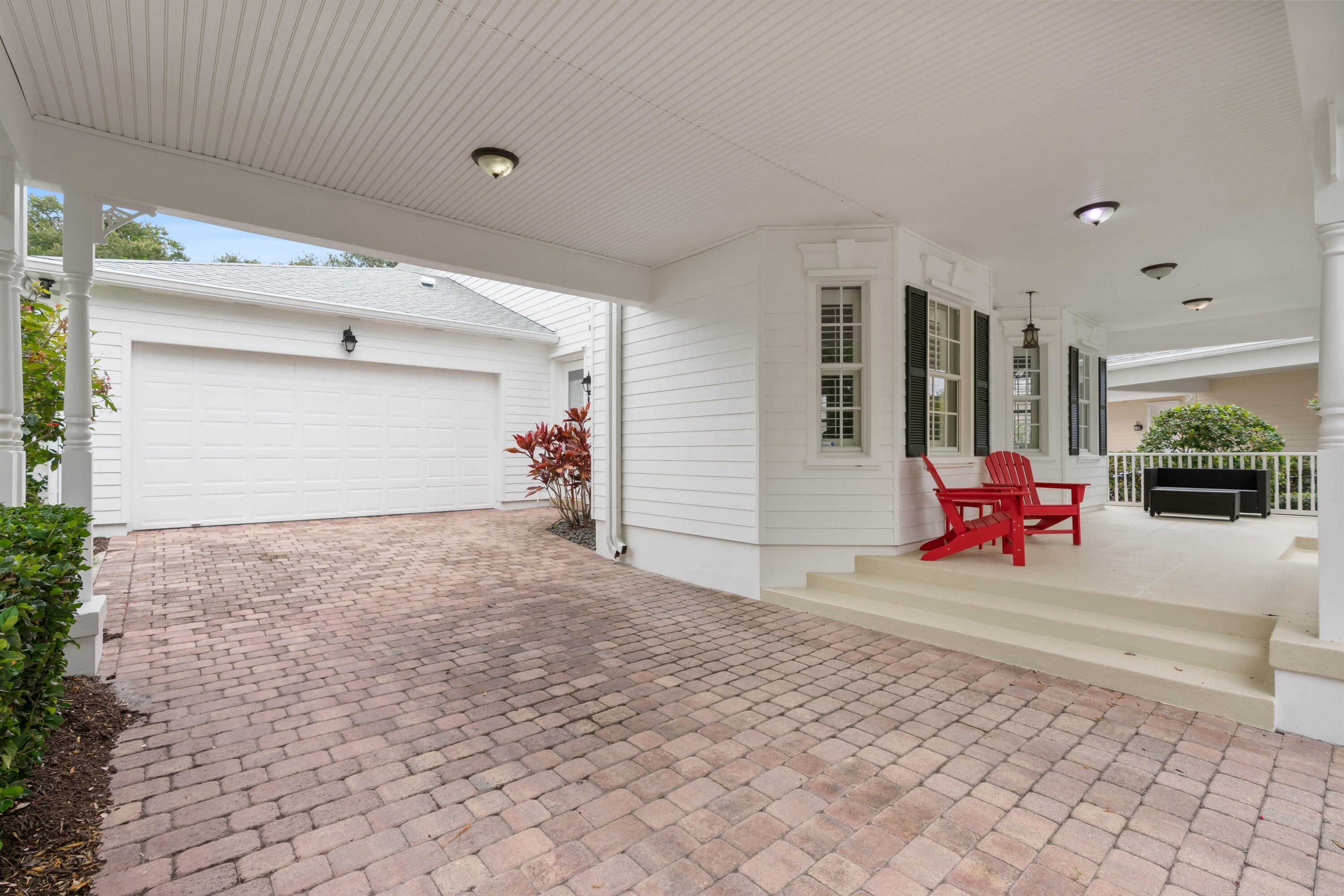 144 Sweet Bay Circle Jupiter, FL 33458 - Photo 43 of 46 a living room with furniture and potted plants
