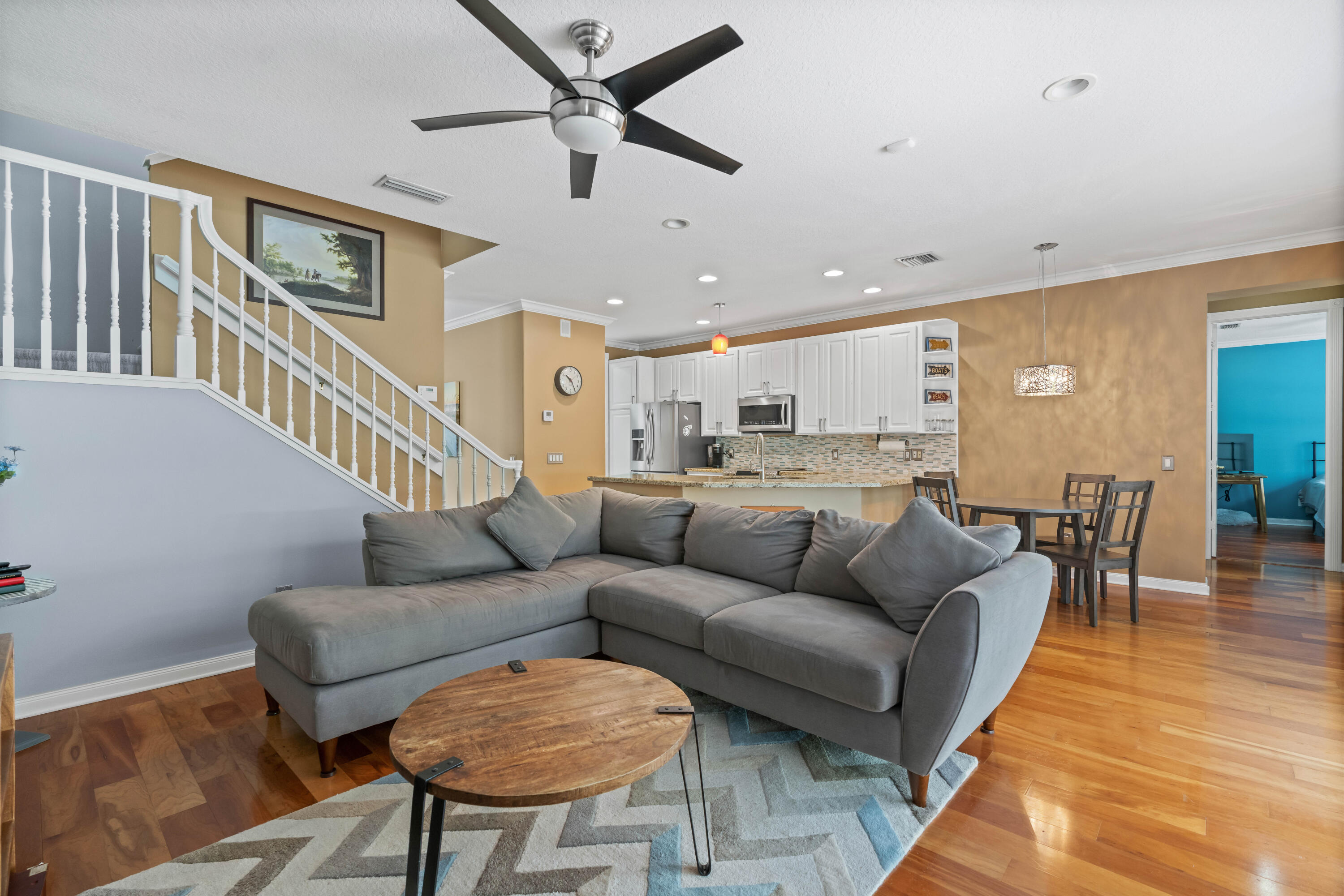 144 Sweet Bay Circle Jupiter, FL 33458 - Photo 10 of 46 a living room with furniture and a ceiling fan