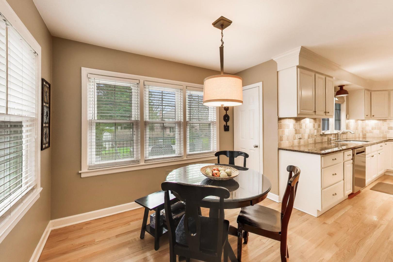 511 South Hi Lusi Avenue Mount Prospect, IL 60056 - Photo 15 of 51 a very nice looking dining room with a table and chairs