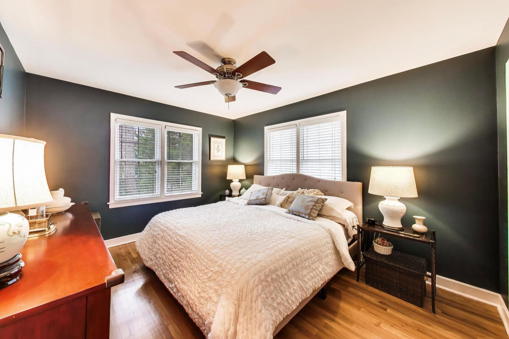 511 South Hi Lusi Avenue Mount Prospect, IL 60056 - Photo 20 of 51 a bedroom with a bed and wooden floor