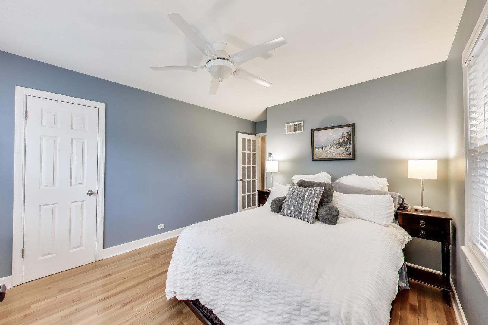 511 South Hi Lusi Avenue Mount Prospect, IL 60056 - Photo 24 of 51 a bedroom with a bed and wooden floor