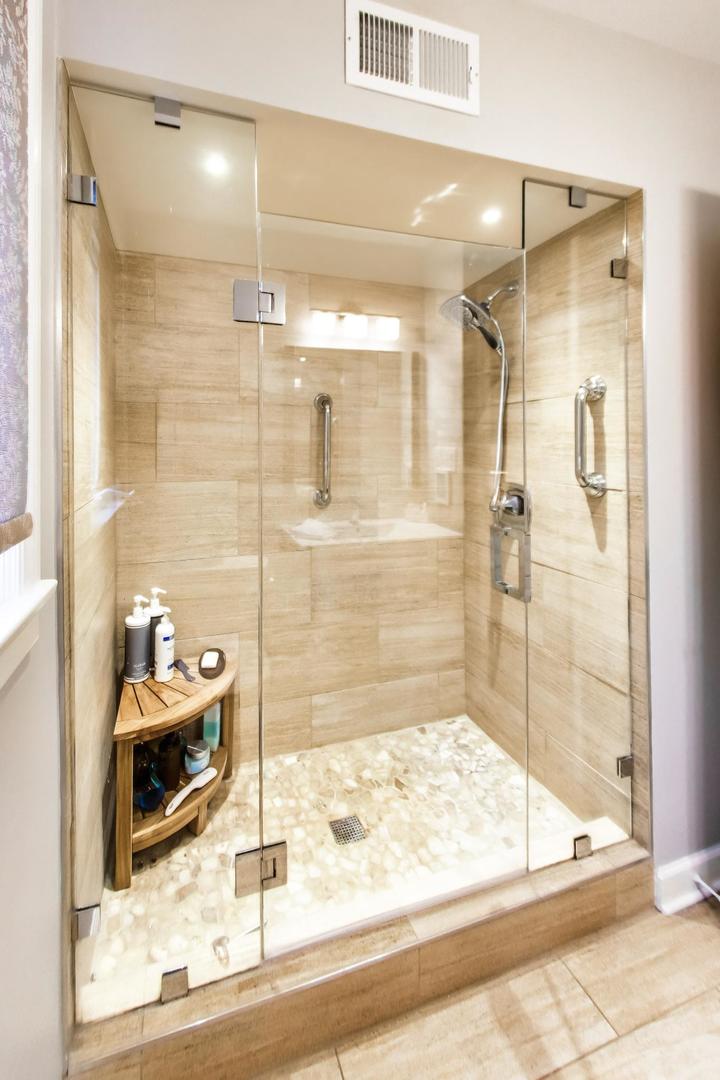 511 South Hi Lusi Avenue Mount Prospect, IL 60056 - Photo 28 of 51 a bathroom with a glass shower door and a glass door shower