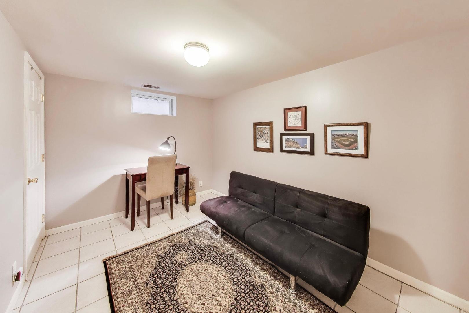 511 South Hi Lusi Avenue Mount Prospect, IL 60056 - Photo 29 of 51 a living room with furniture and a dining table