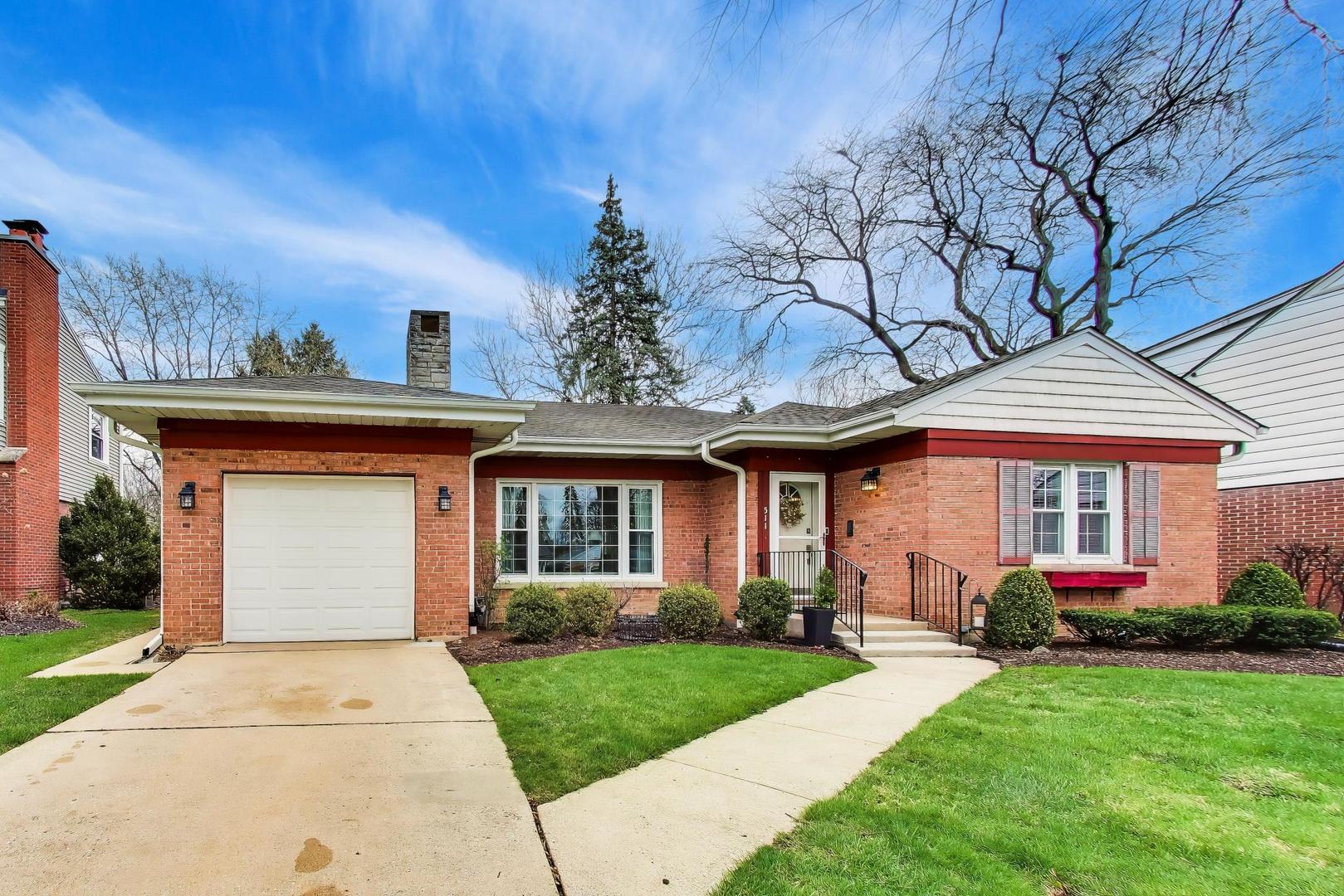 511 South Hi Lusi Avenue Mount Prospect, IL 60056 - Photo 3 of 51 a front view of a house with garden