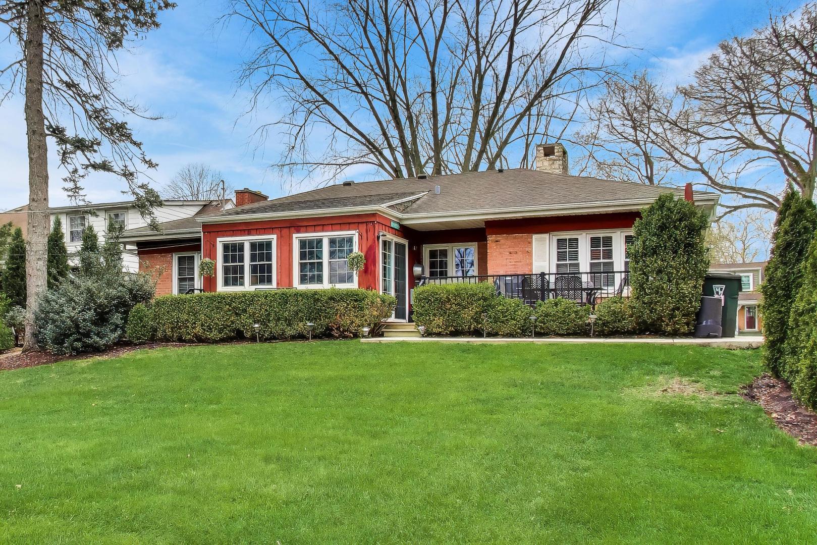 511 South Hi Lusi Avenue Mount Prospect, IL 60056 - Photo 42 of 51 a front view of a house with a garden