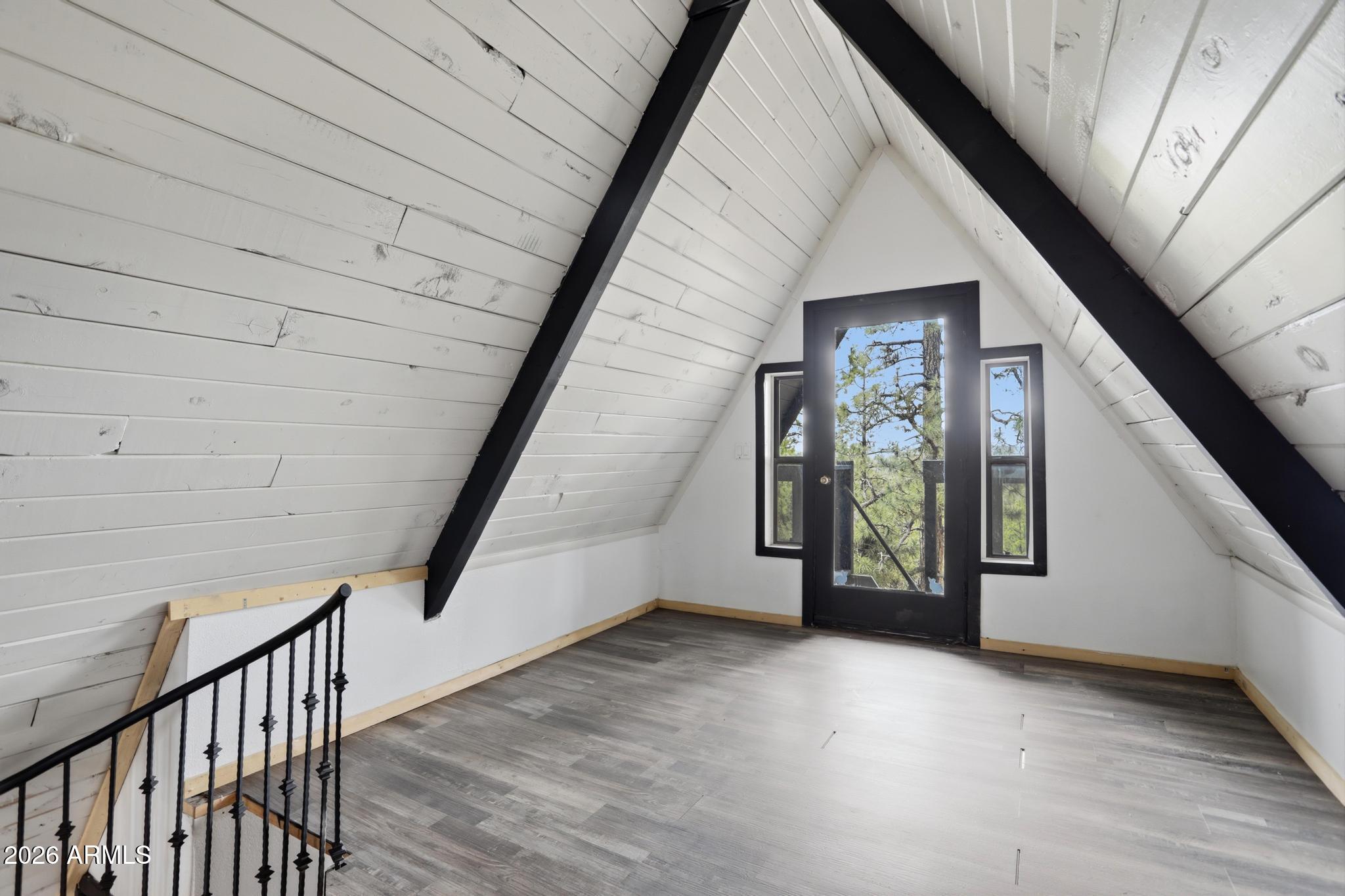 1725 Turkey Mountain Road Happy Jack, AZ 86024 - Photo 12 of 18 a view of an entryway with staircase
