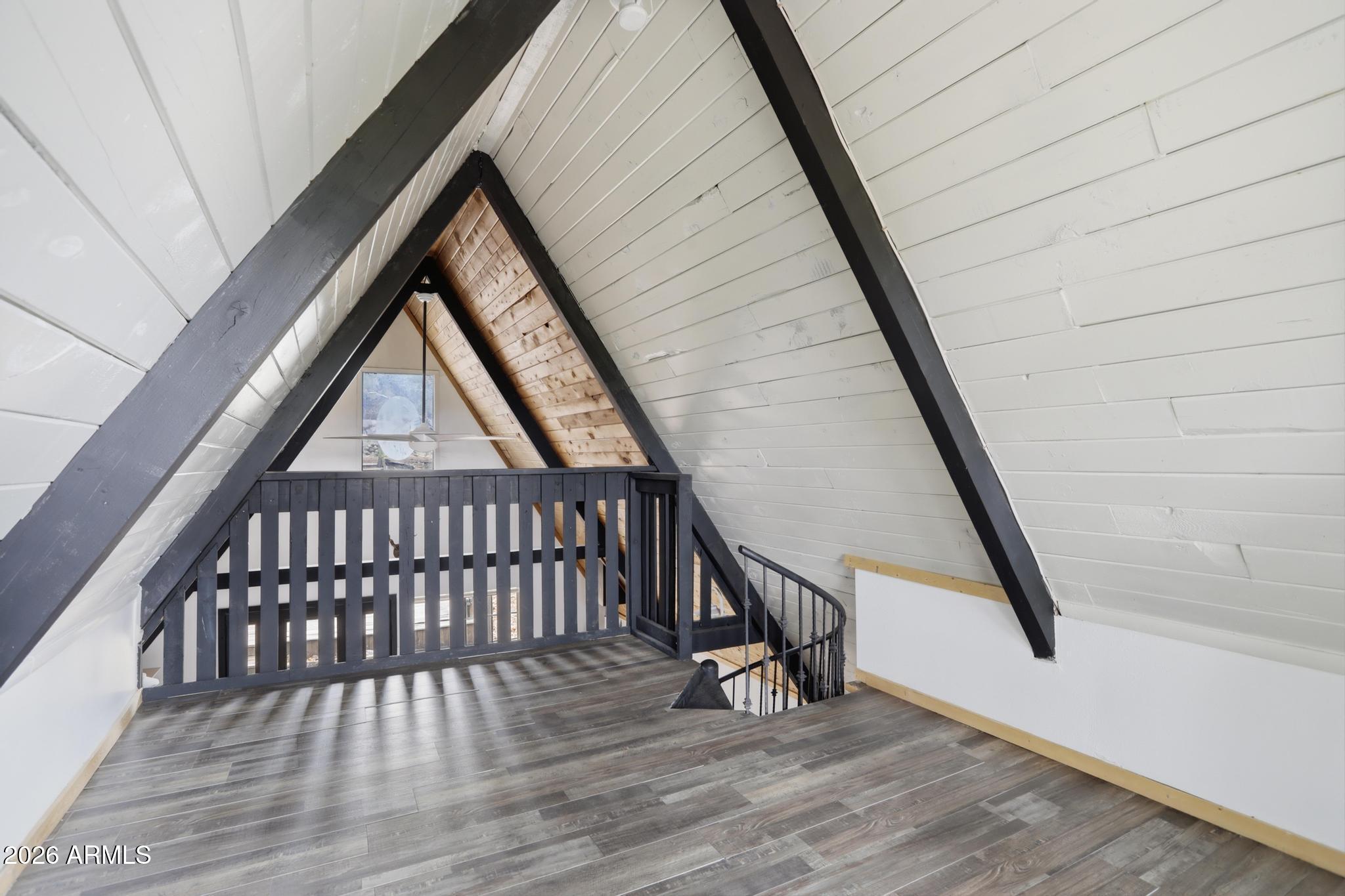 1725 Turkey Mountain Road Happy Jack, AZ 86024 - Photo 13 of 18 a view of staircase with large window