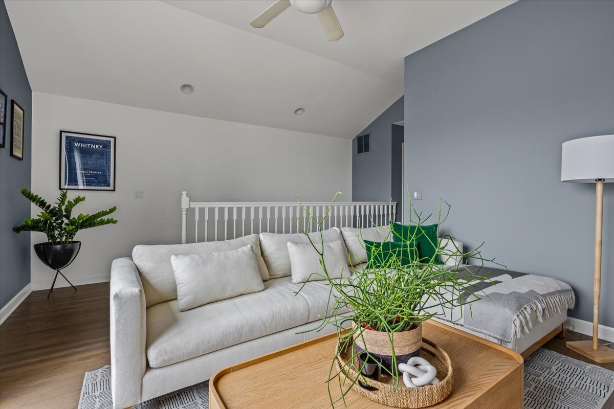 618 North May Street, Unit C Chicago, IL 60642 - Photo 18 of 30 a living room with furniture and a potted plant