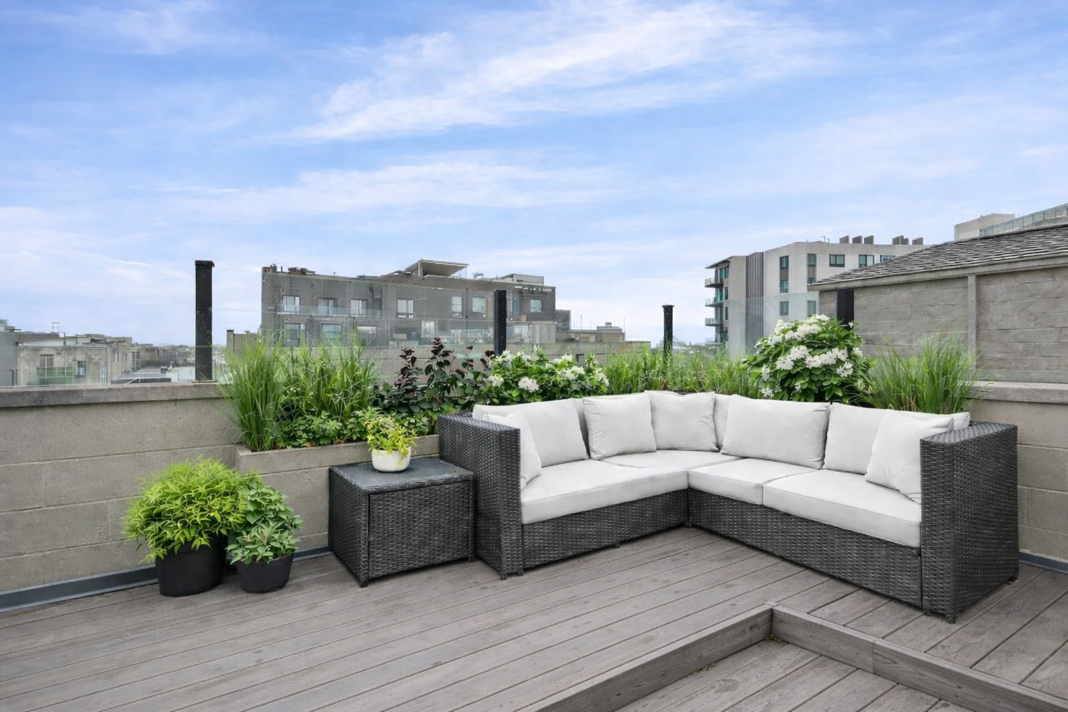 618 North May Street, Unit C Chicago, IL 60642 - Photo 27 of 30 a view of a terrace with couches and potted plants