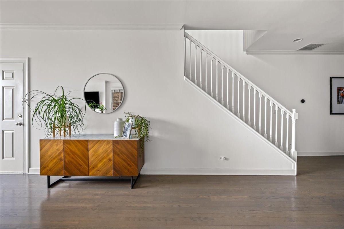 618 North May Street, Unit C Chicago, IL 60642 - Photo 9 of 30 a view of entryway and hall with wooden floor