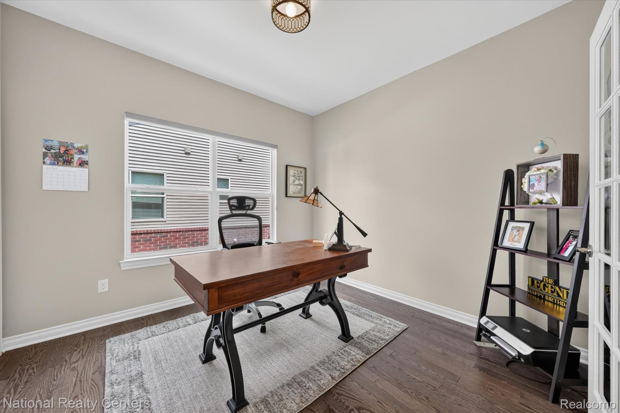 740 North Mill Street South Lyon, MI 48178 - Photo 23 of 56 Bright room with wood-finish flooring and neutral wall tones
