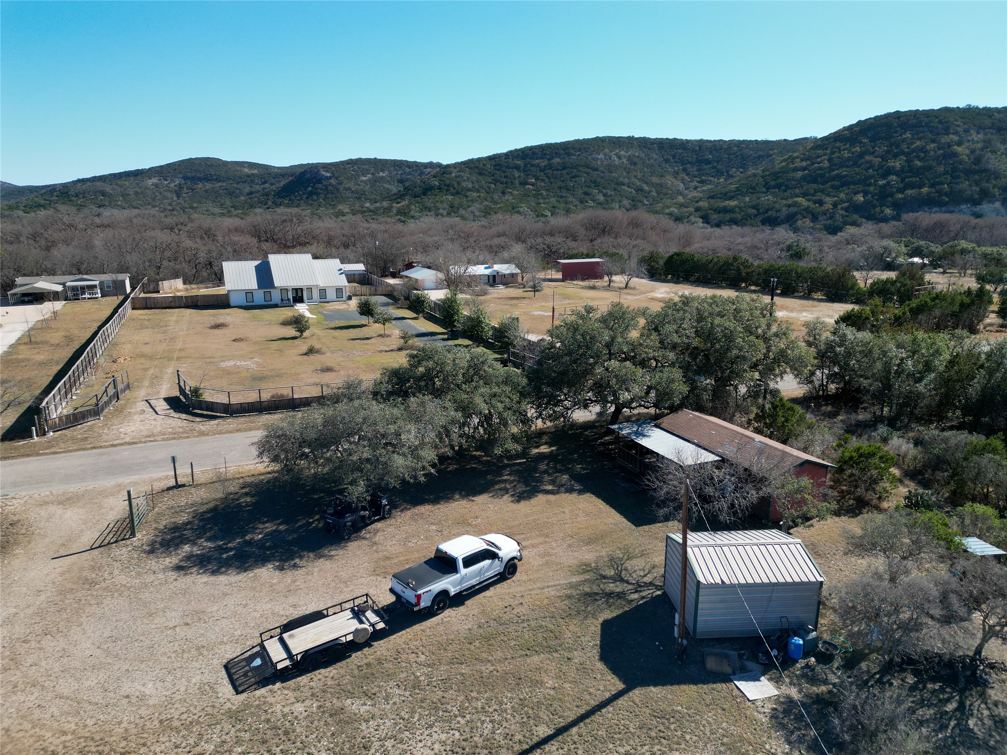 831 Magers Road Concan, TX 78838 - Photo 18 of 39 View of rural area featuring a mountain backdrop