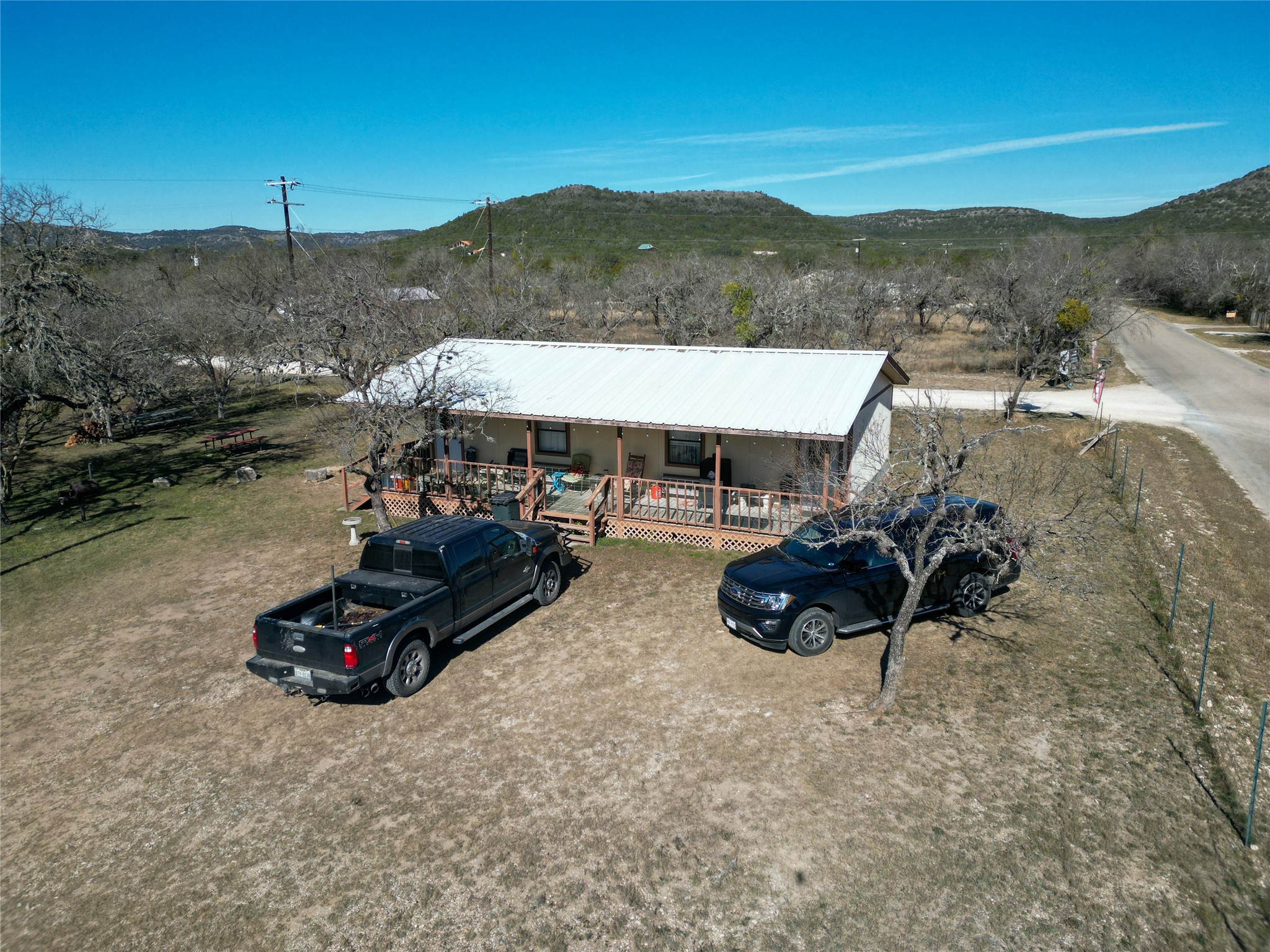 831 Magers Road Concan, TX 78838 - Photo 10 of 39 Bird's eye view of a mountain backdrop