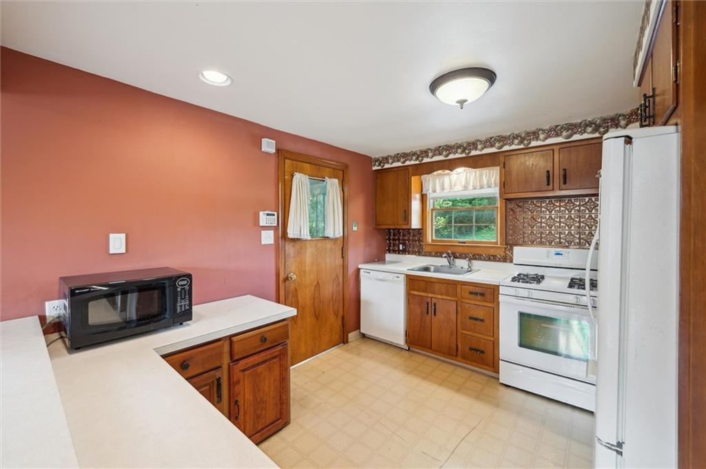 863 Hamil Road Verona, PA 15147 - Photo 6 of 26 kitchen with access to side porch