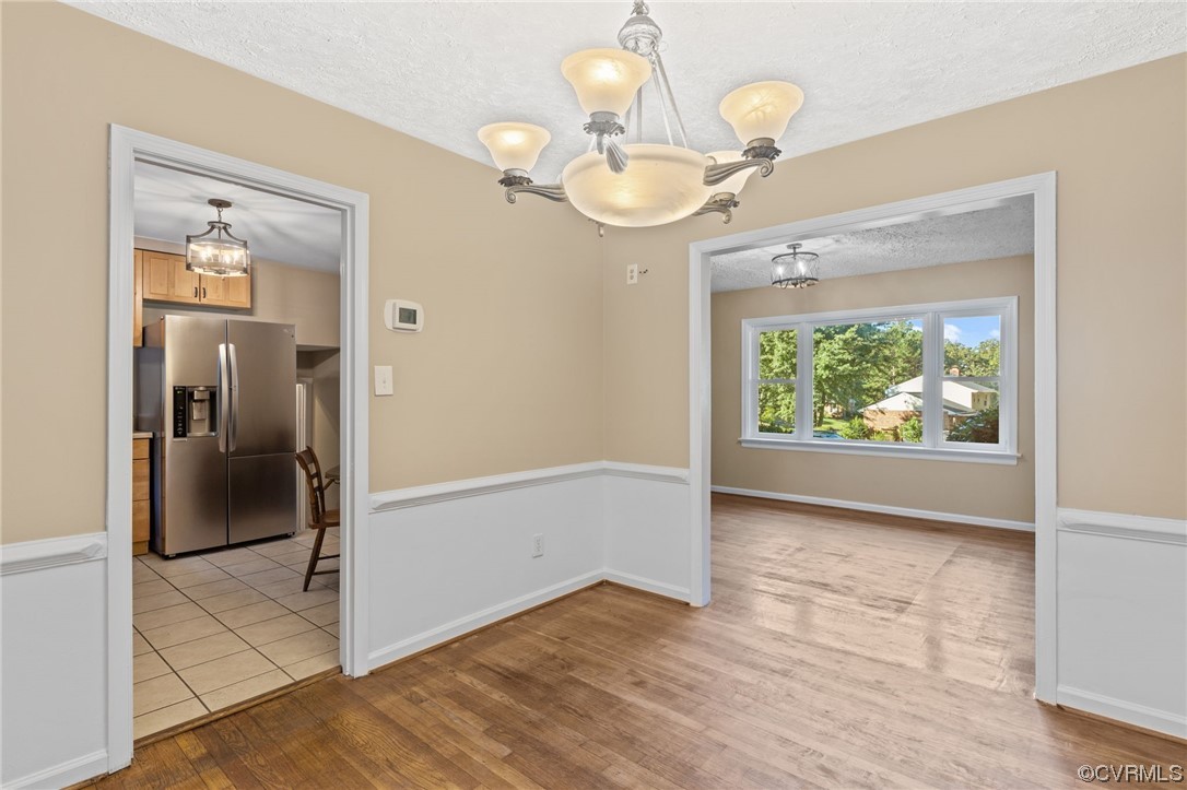 1601 Olde Coalmine Road Midlothian, VA 23113 - Photo 11 of 40 wooden floor in an empty room with a window